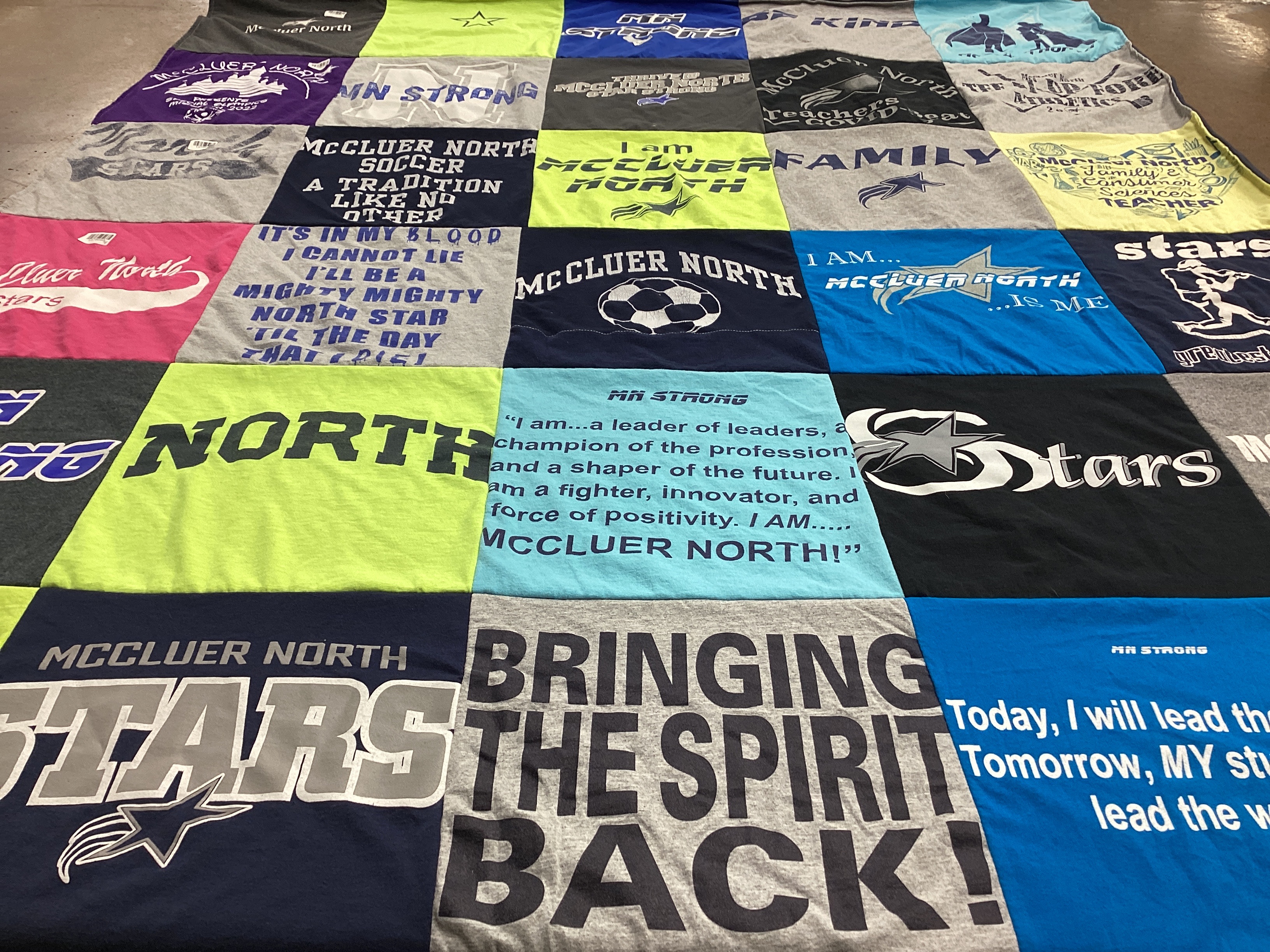 T-shirt quilt featuring mccluer north stars by meghan from IL