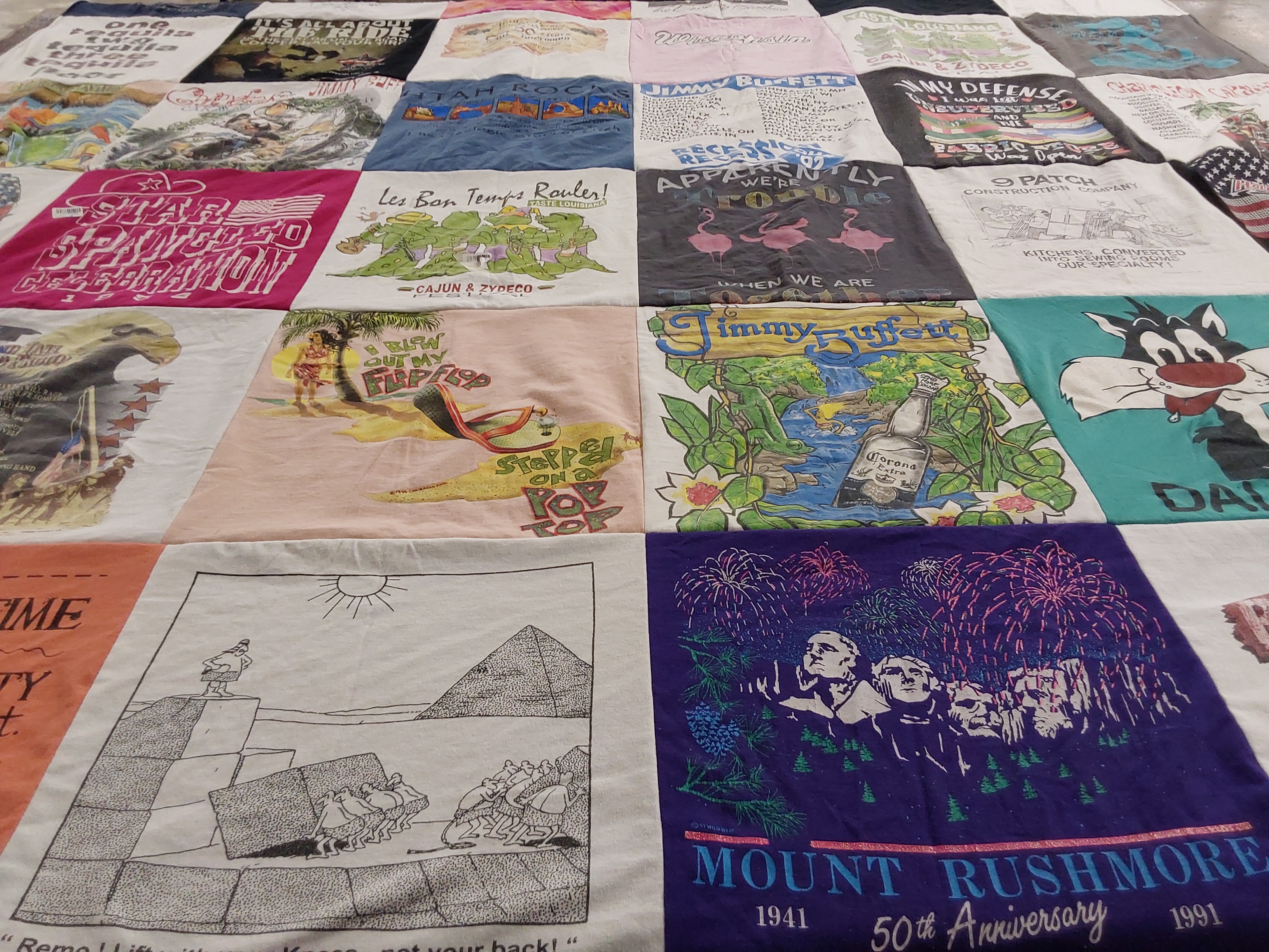 T-shirt quilt with music, festivals themes by Linda from MO