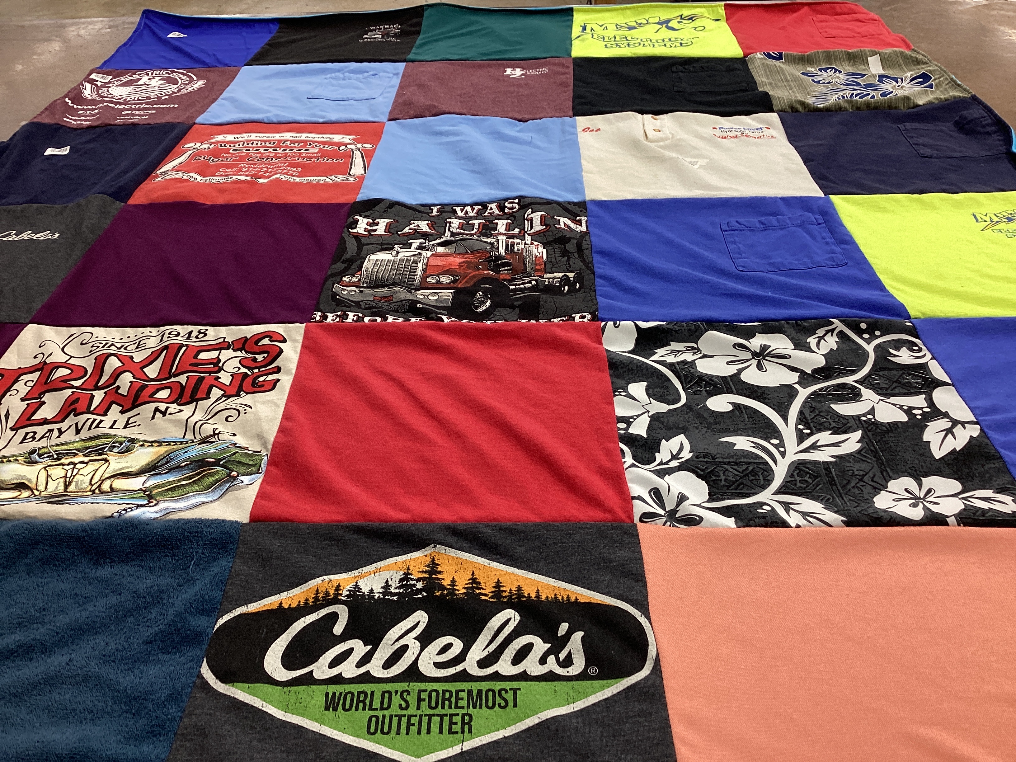 T-shirt quilt with fishing, trucks themes by Josephine from NY