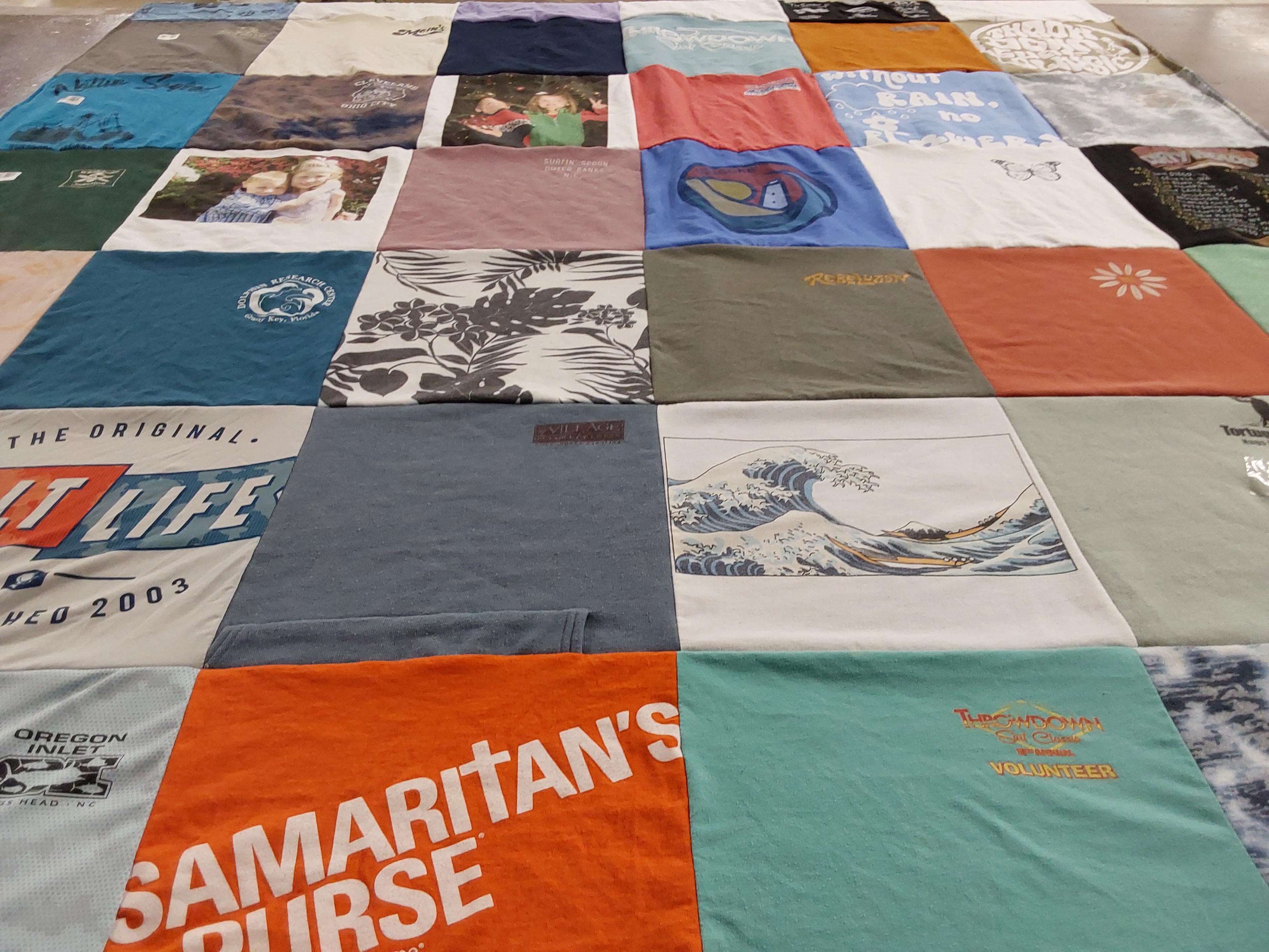 T-shirt quilt with volunteering, community service themes by Victoria from NC