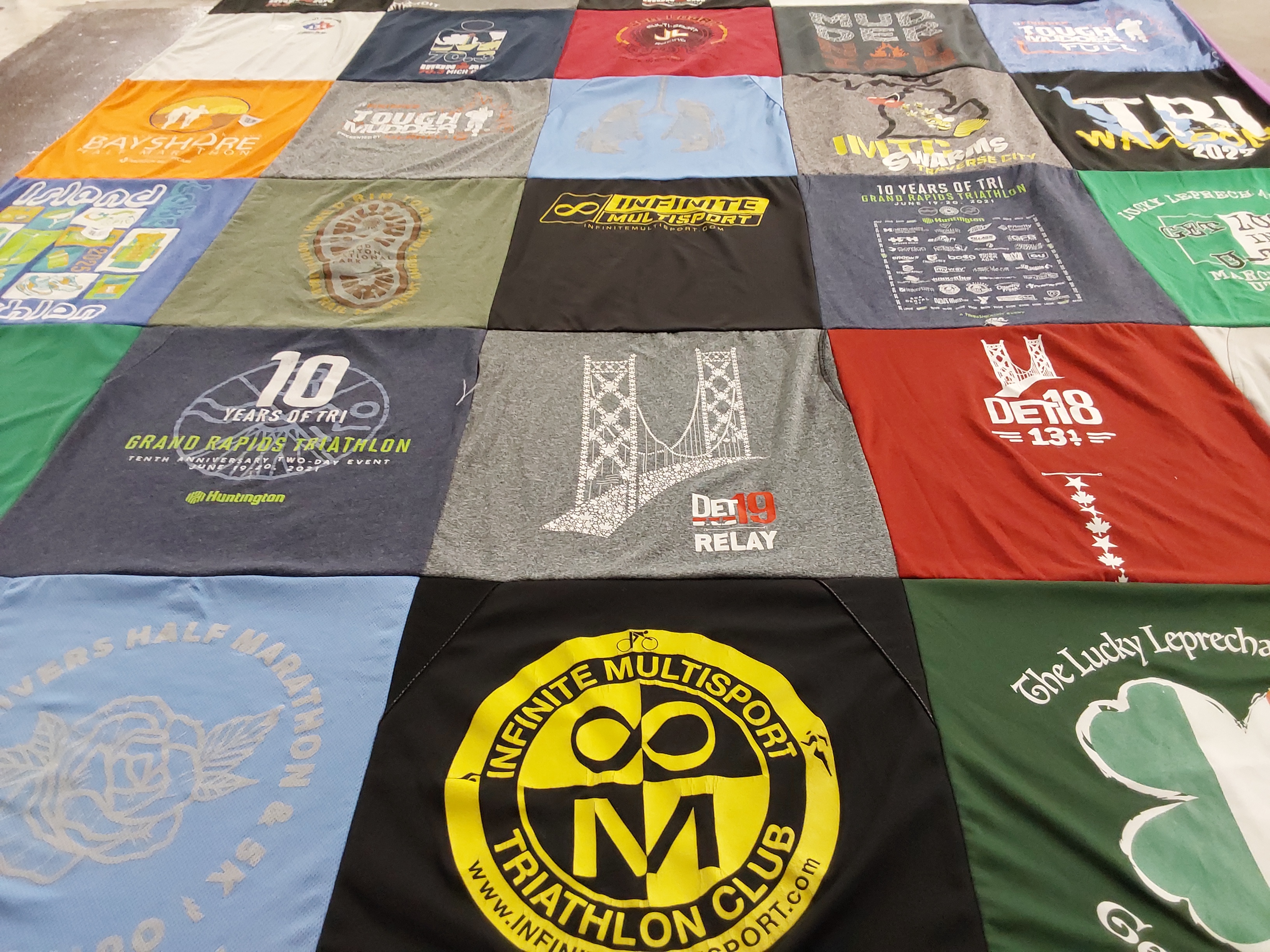 T-shirt quilt with triathlon, sports themes by Warren from MI