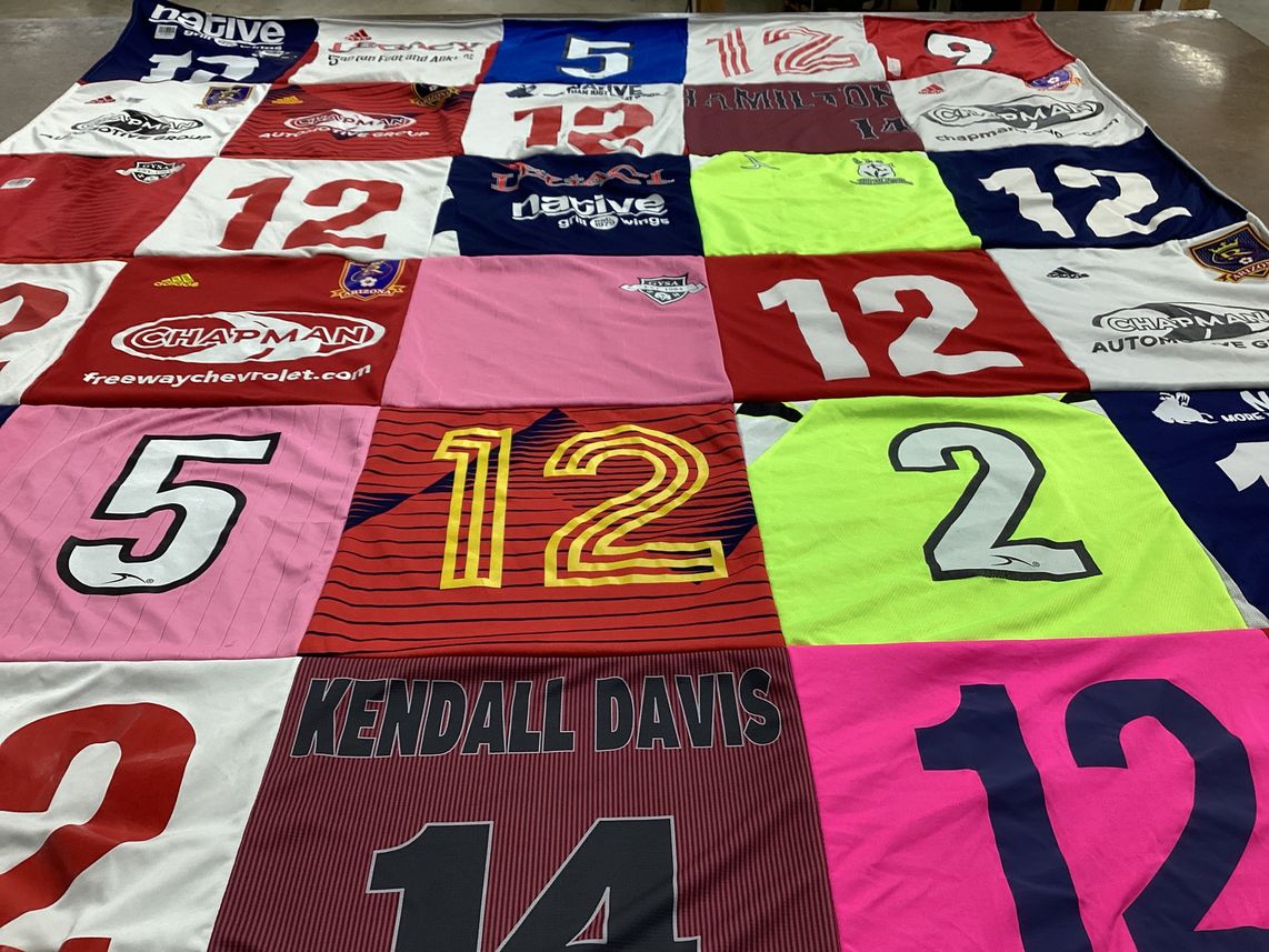 T-shirt quilt with soccer, sports themes by Jamison from AZ