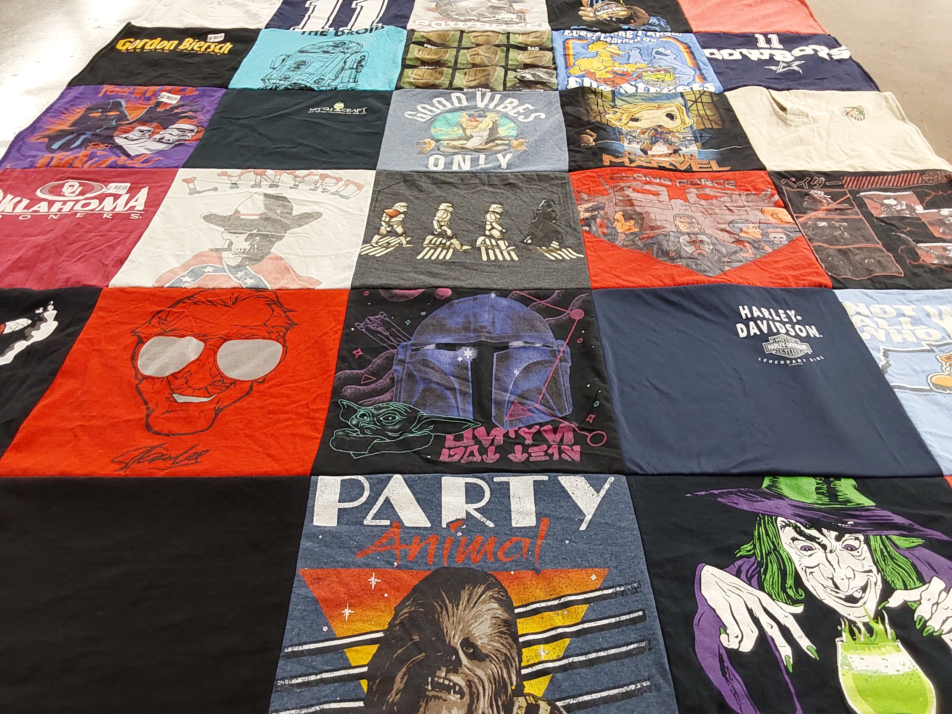 Custom Project Repat t-shirt quilt with dallas cowboys team logos.