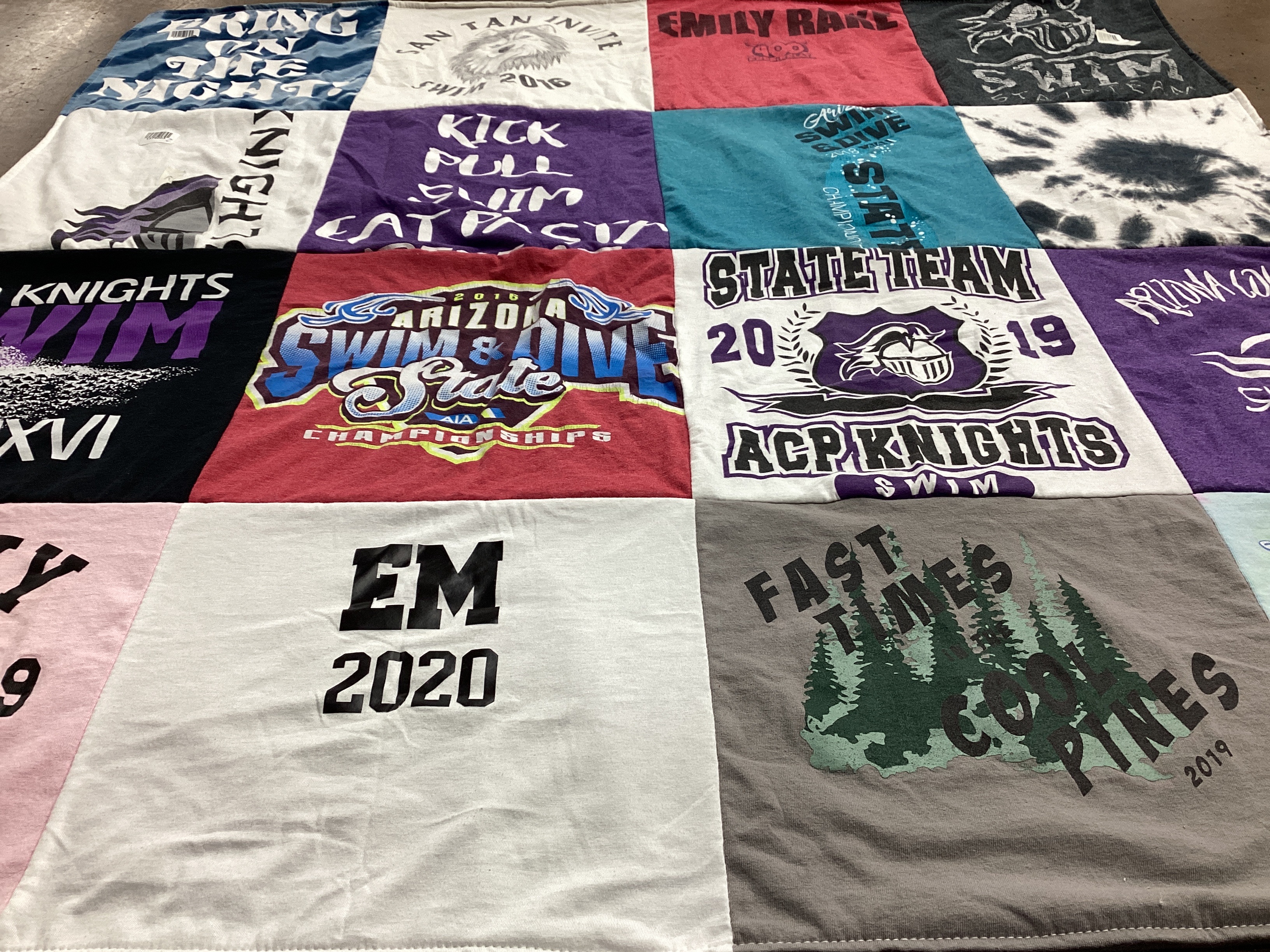 T-shirt quilt featuring acp knights swim by Jennifer from AZ