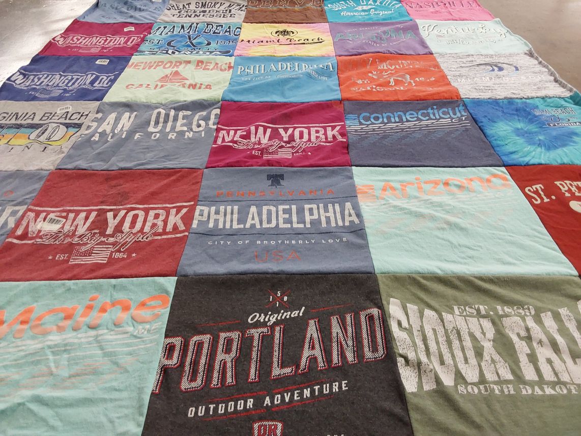 T-shirt quilt with travel, geography themes by Yvette from IN