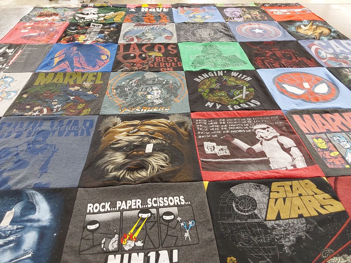 T-shirt quilt with comics, superheroes themes by Katie from KS
