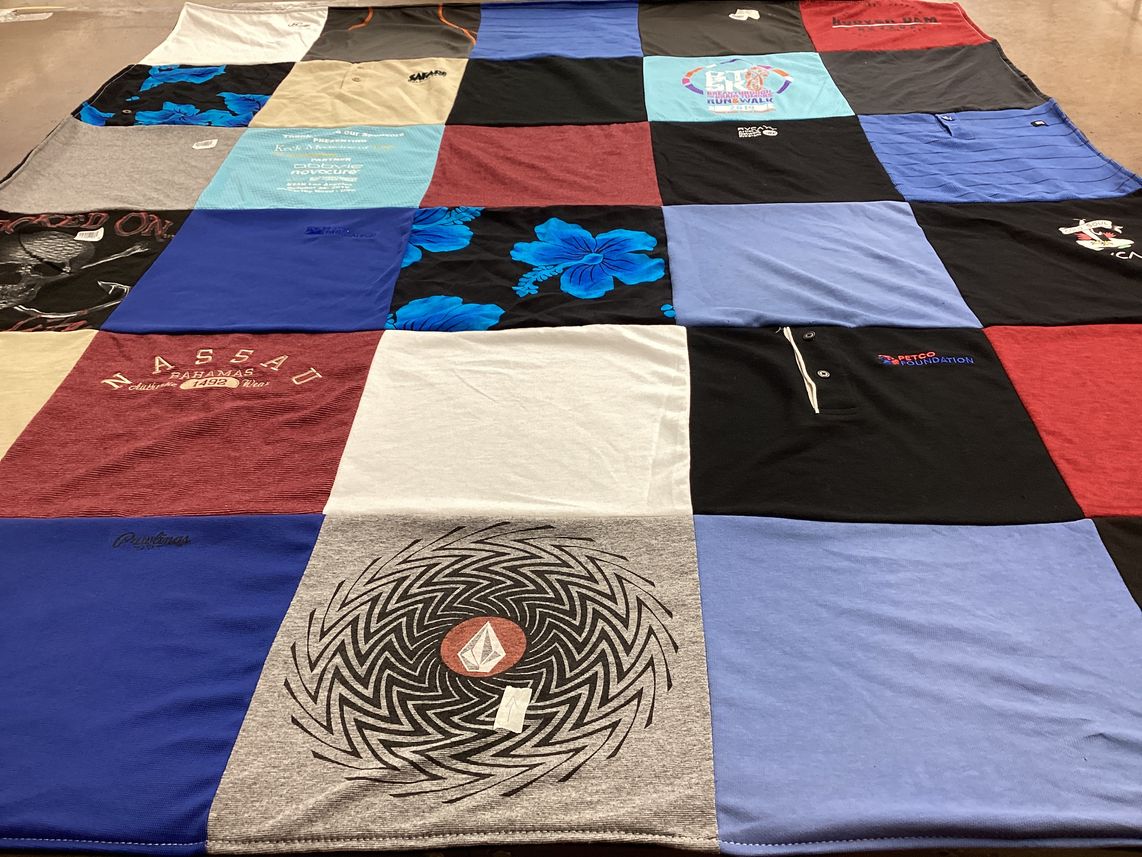 T-shirt quilt with travel, beaches themes by Irene from CA