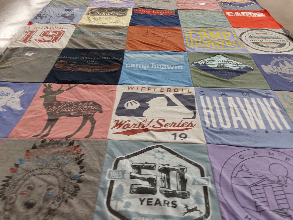 T-shirt quilt with camping, sports themes by Anna from TX