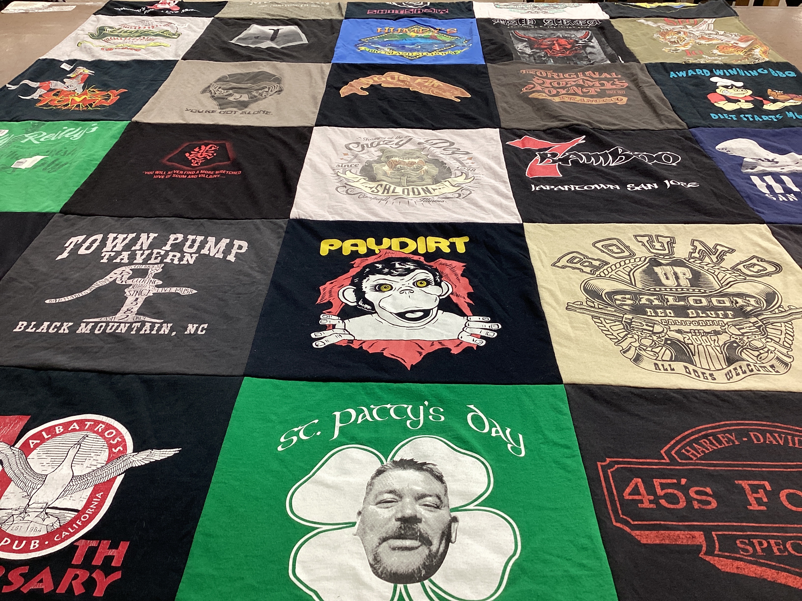 T-shirt quilt with bars, restaurants themes by Sue from WI