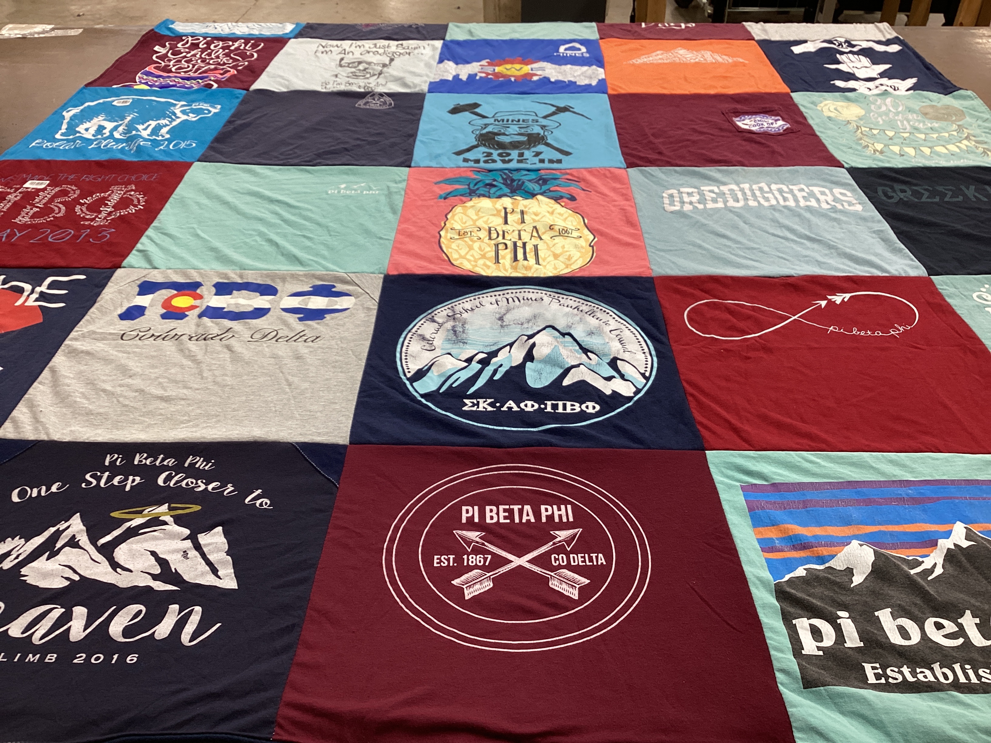 T-shirt quilt with sororities, mountains themes by Skyler from OK