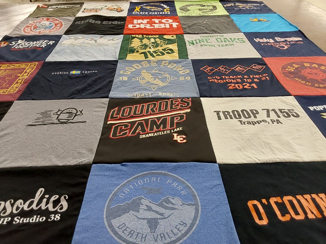 T-shirt quilt featuring swim team by Amy from PA