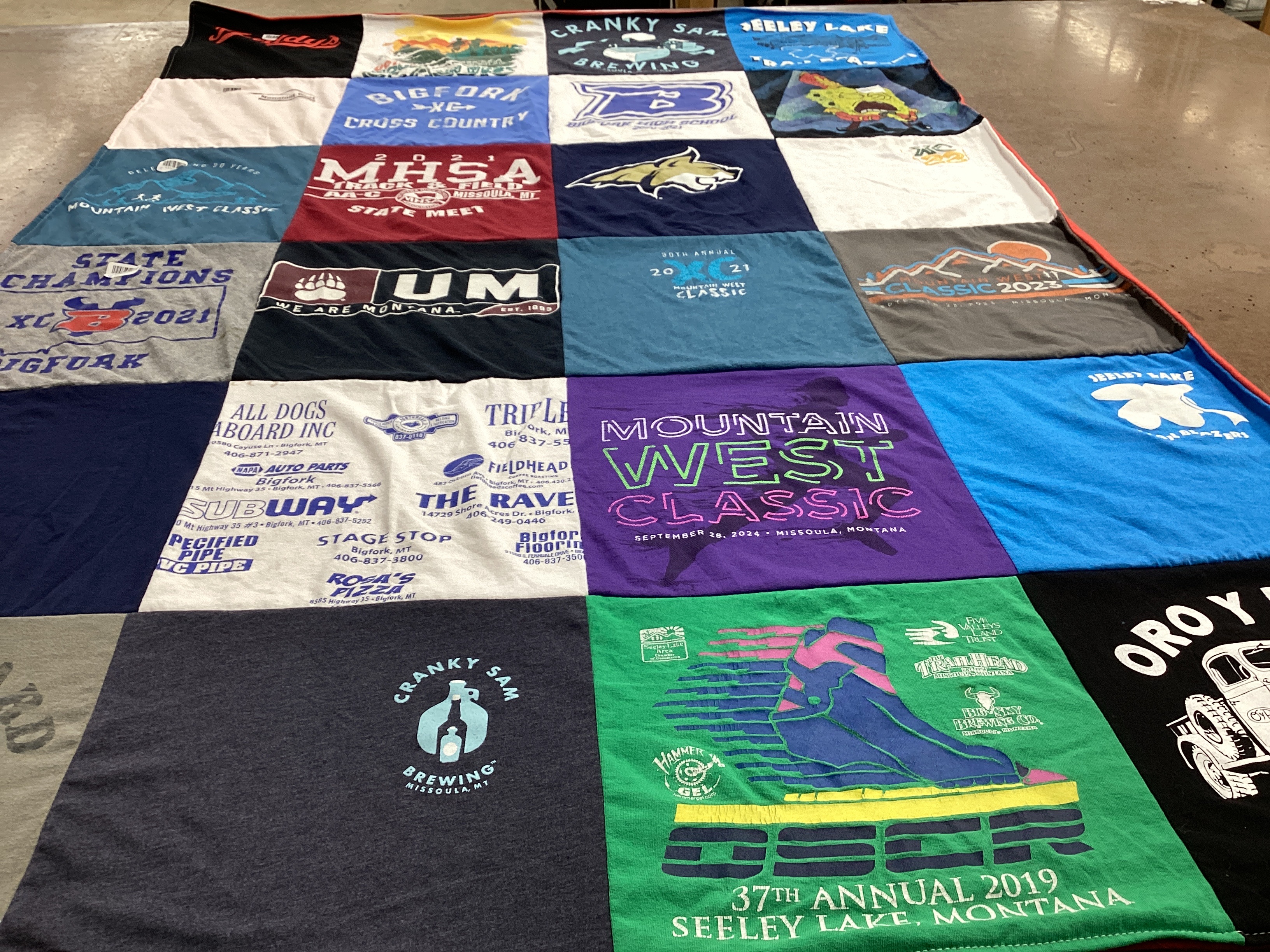 T-shirt quilt featuring bigfork cross country team by Shanon from MT