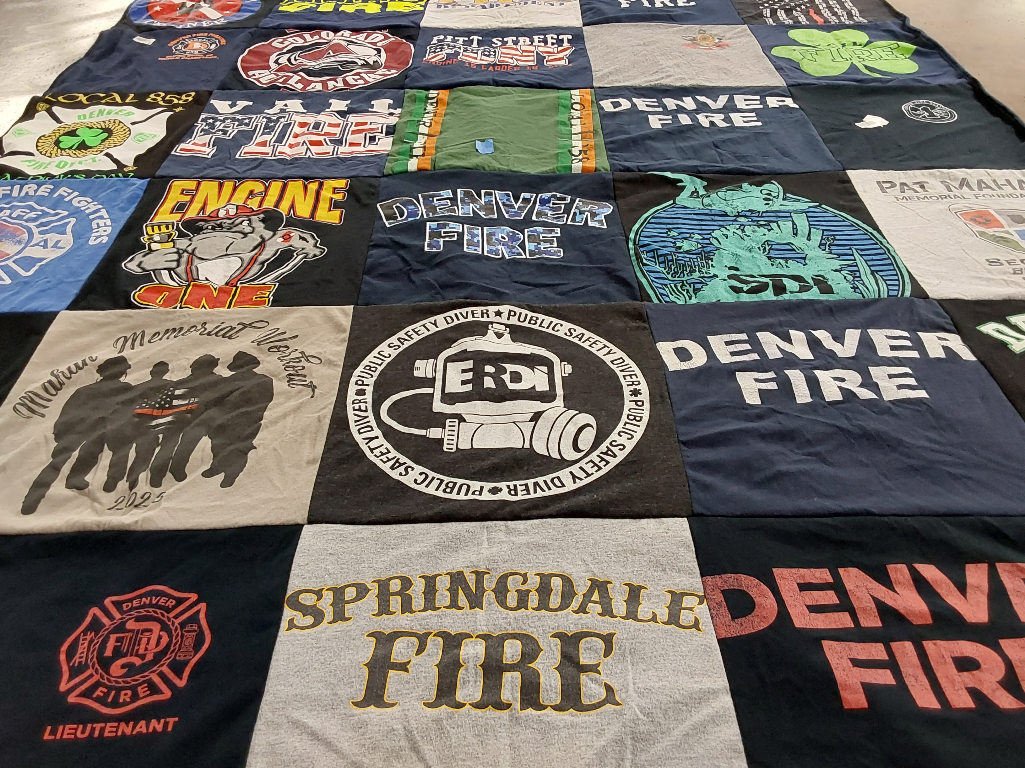 T-shirt quilt with firefighting, public safety themes by Jeffrey from CO