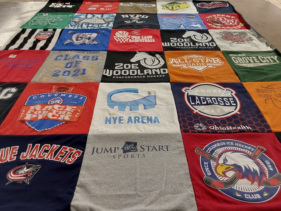 T-shirt quilt featuring blue jackets by Brandy from OH