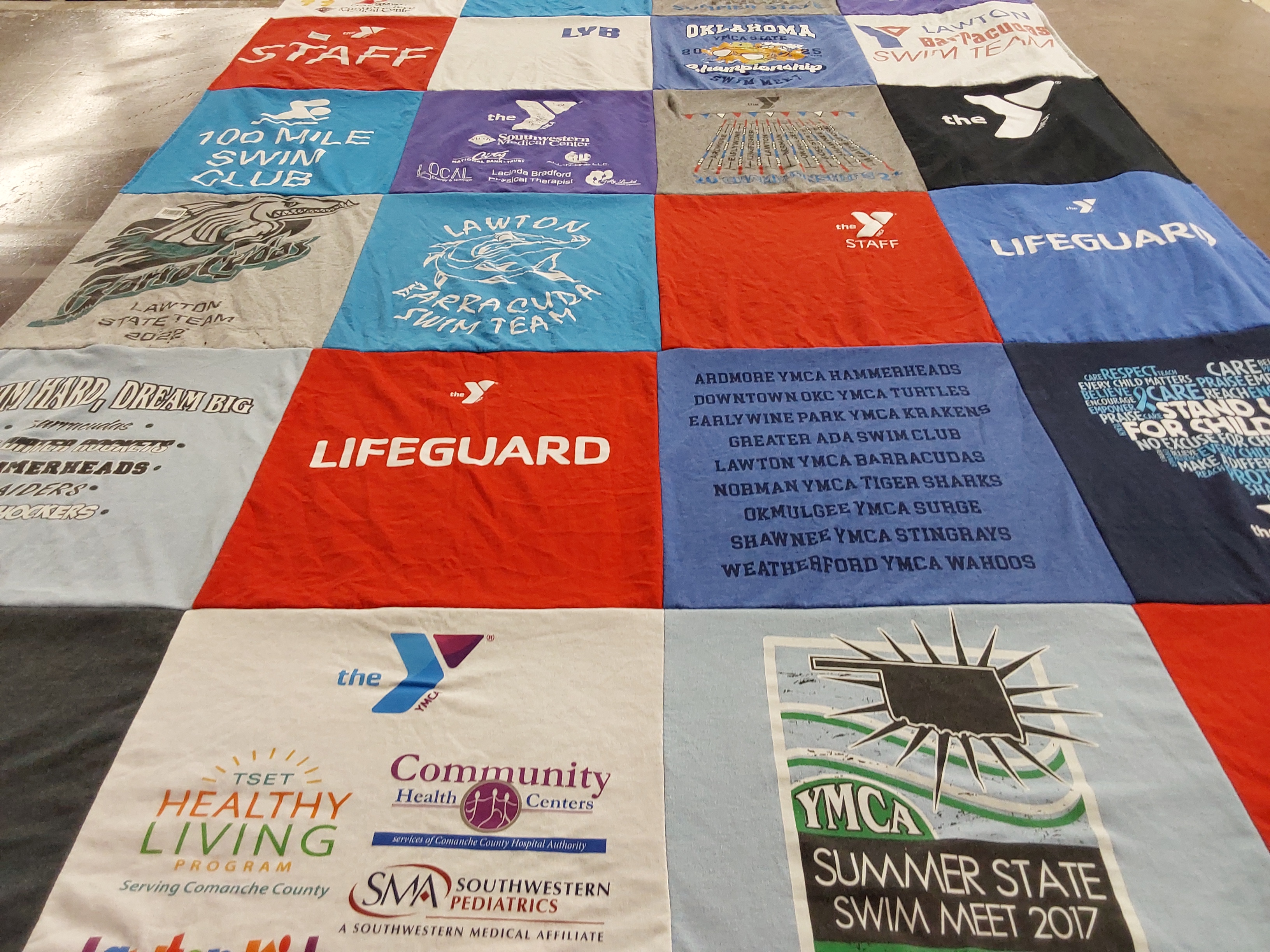T-shirt quilt featuring lawton swim team, downtown okc ymca turtles by Shari from OK