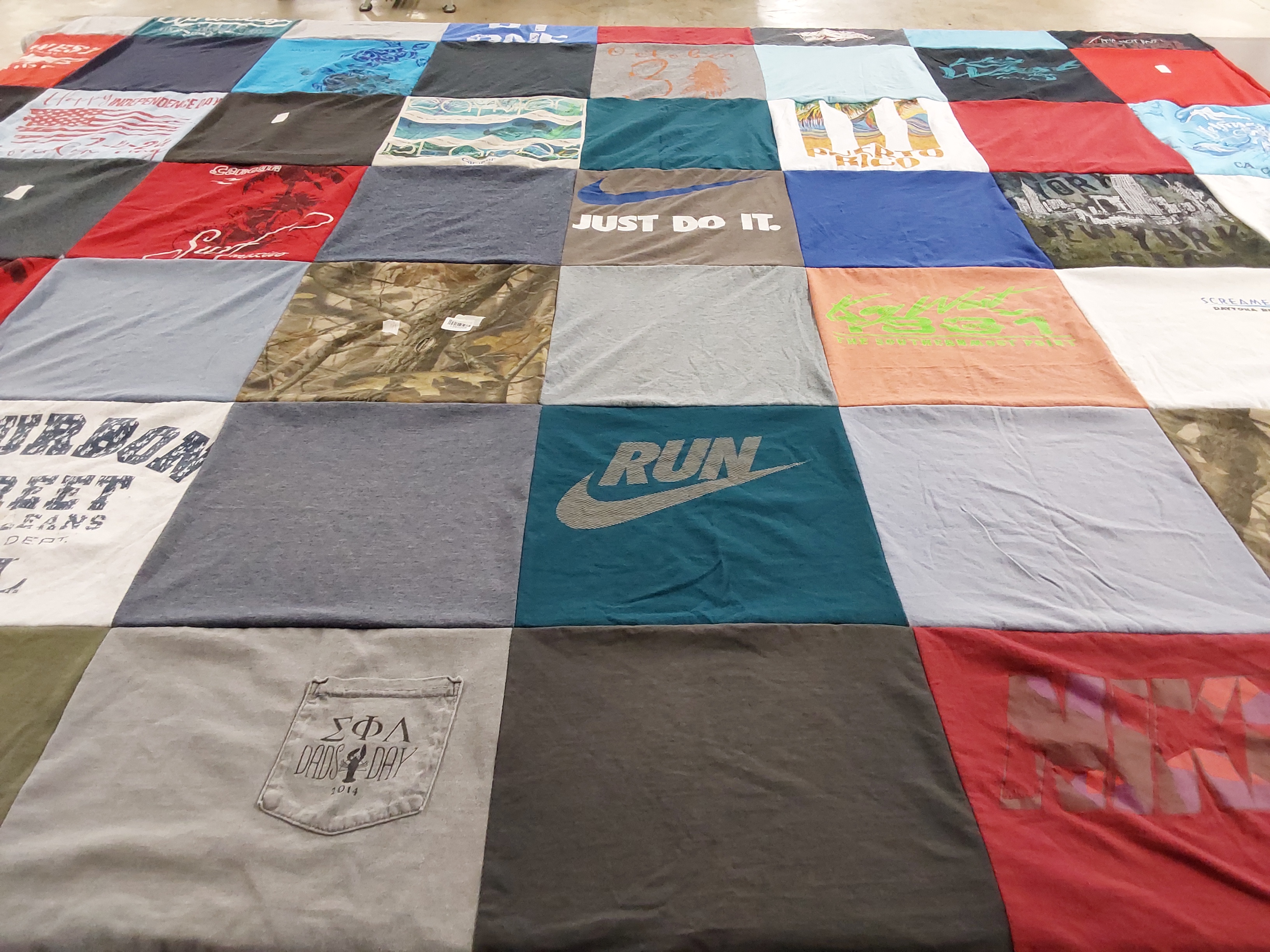 T-shirt quilt with sports, outdoors themes by Alicia from AR