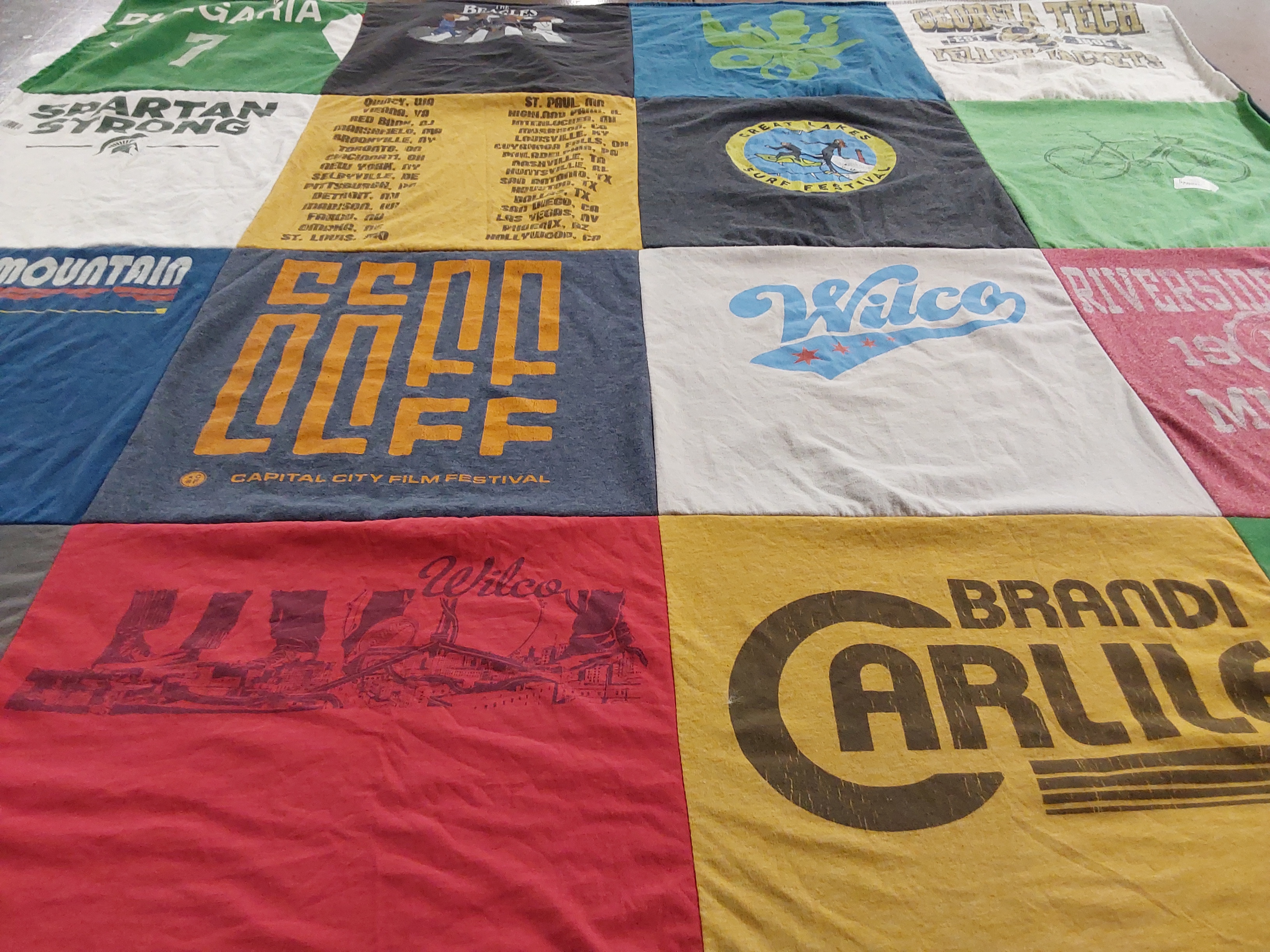 T-shirt quilt with music, film themes by Andrew from MI