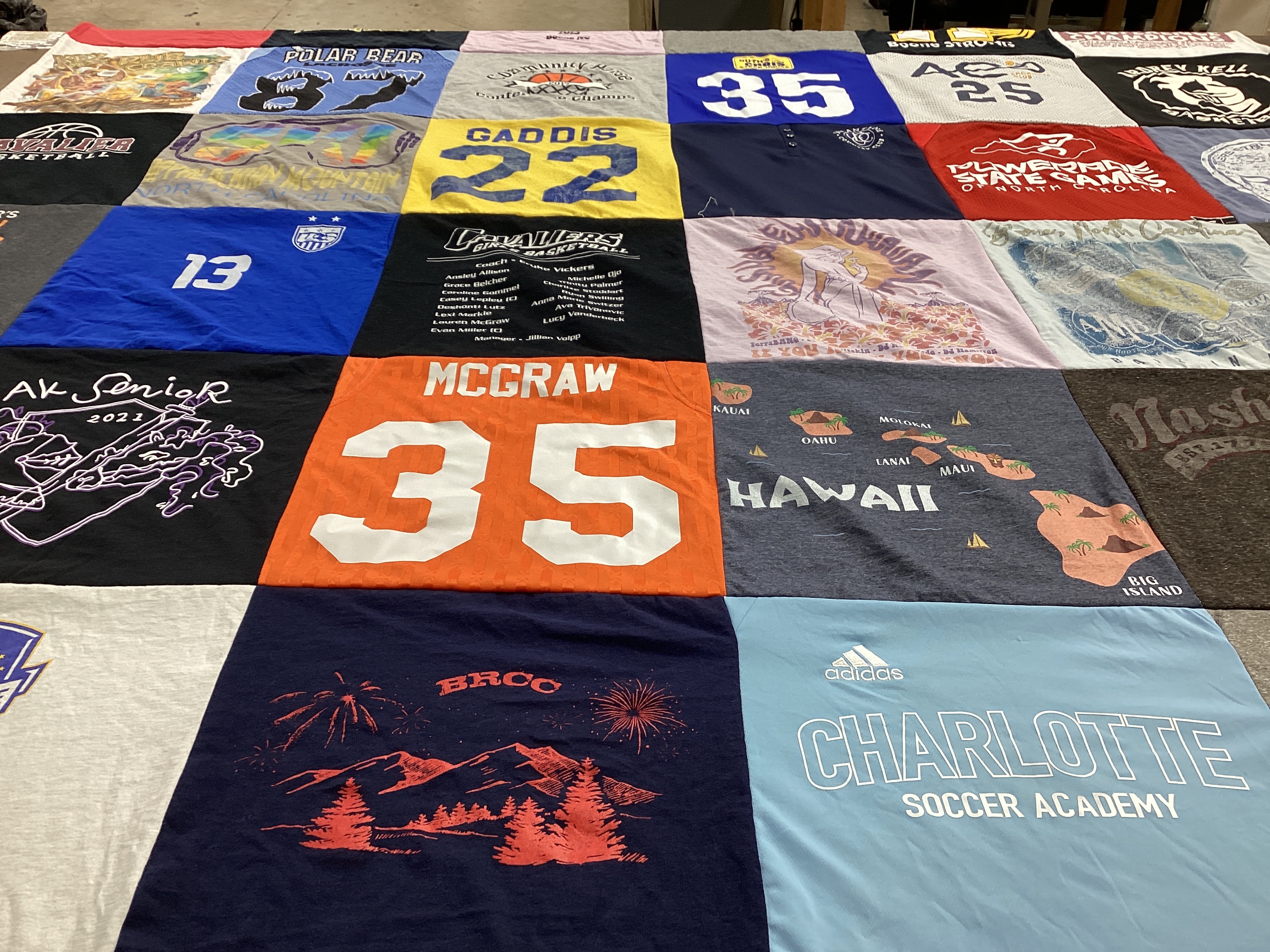 T-shirt quilt with basketball, soccer themes by Angie from NC