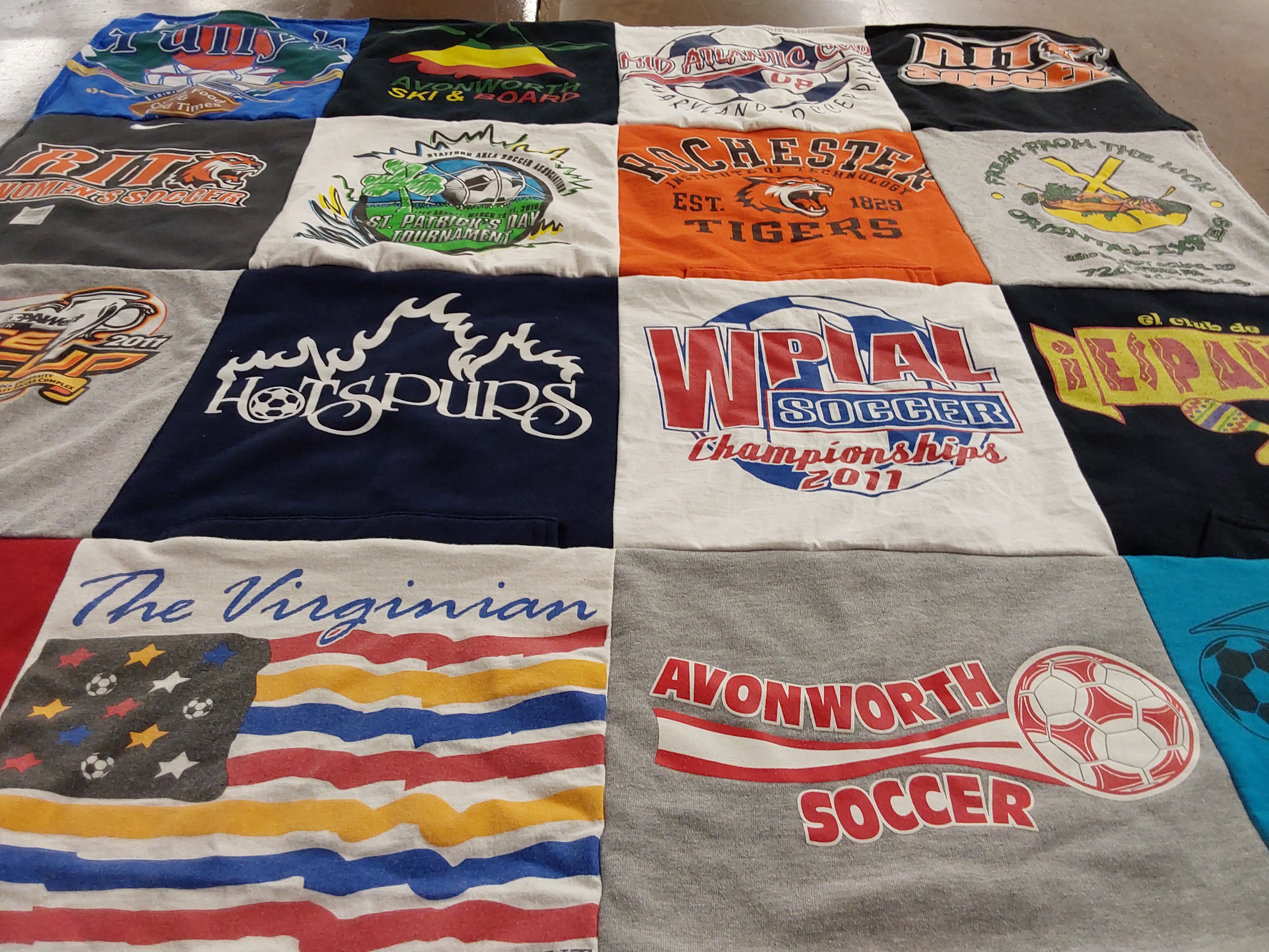 T-shirt quilt featuring avonworth soccer team, rochester tigers sports team by Rebecca from NV