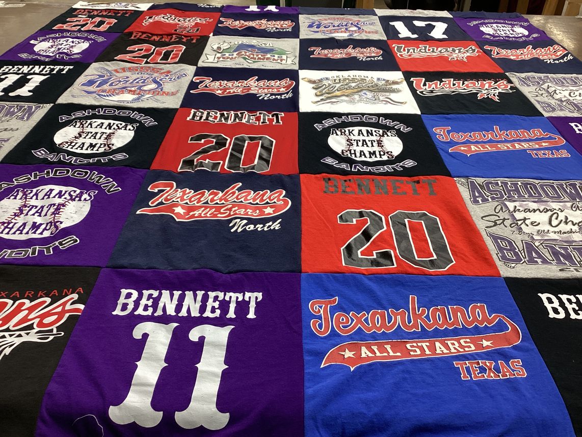 T-shirt quilt with sports, youth athletics themes by Kym from GA