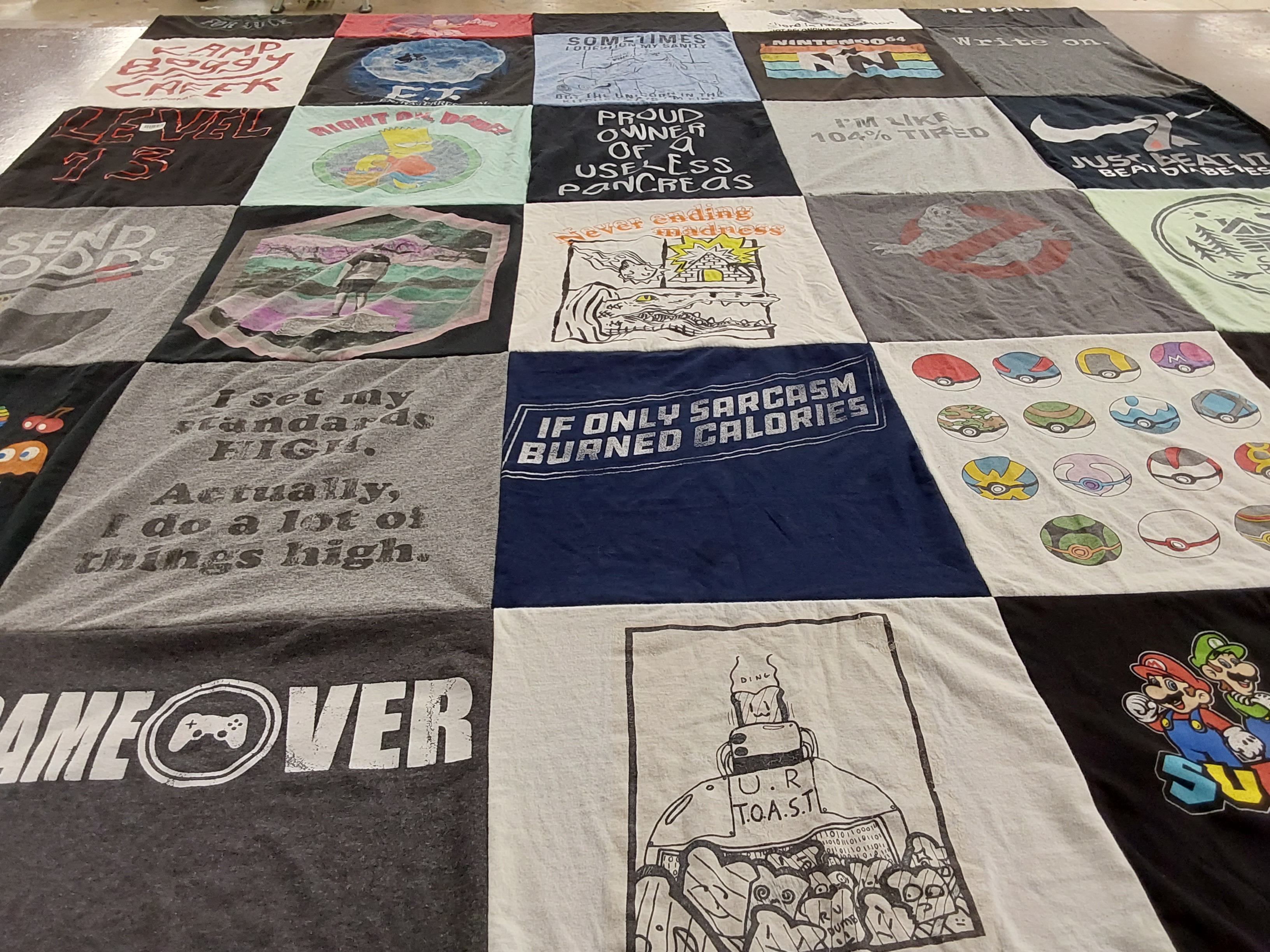 T-shirt quilt with video games, humor themes by Gabrielly from NC