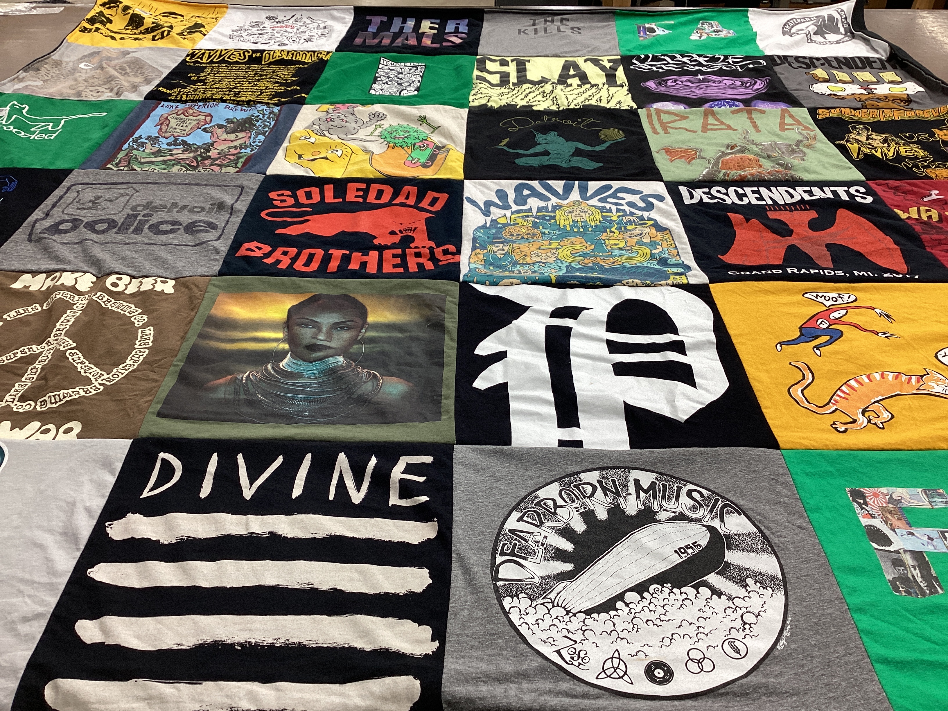 T-shirt quilt with music, art themes by Amber from MI