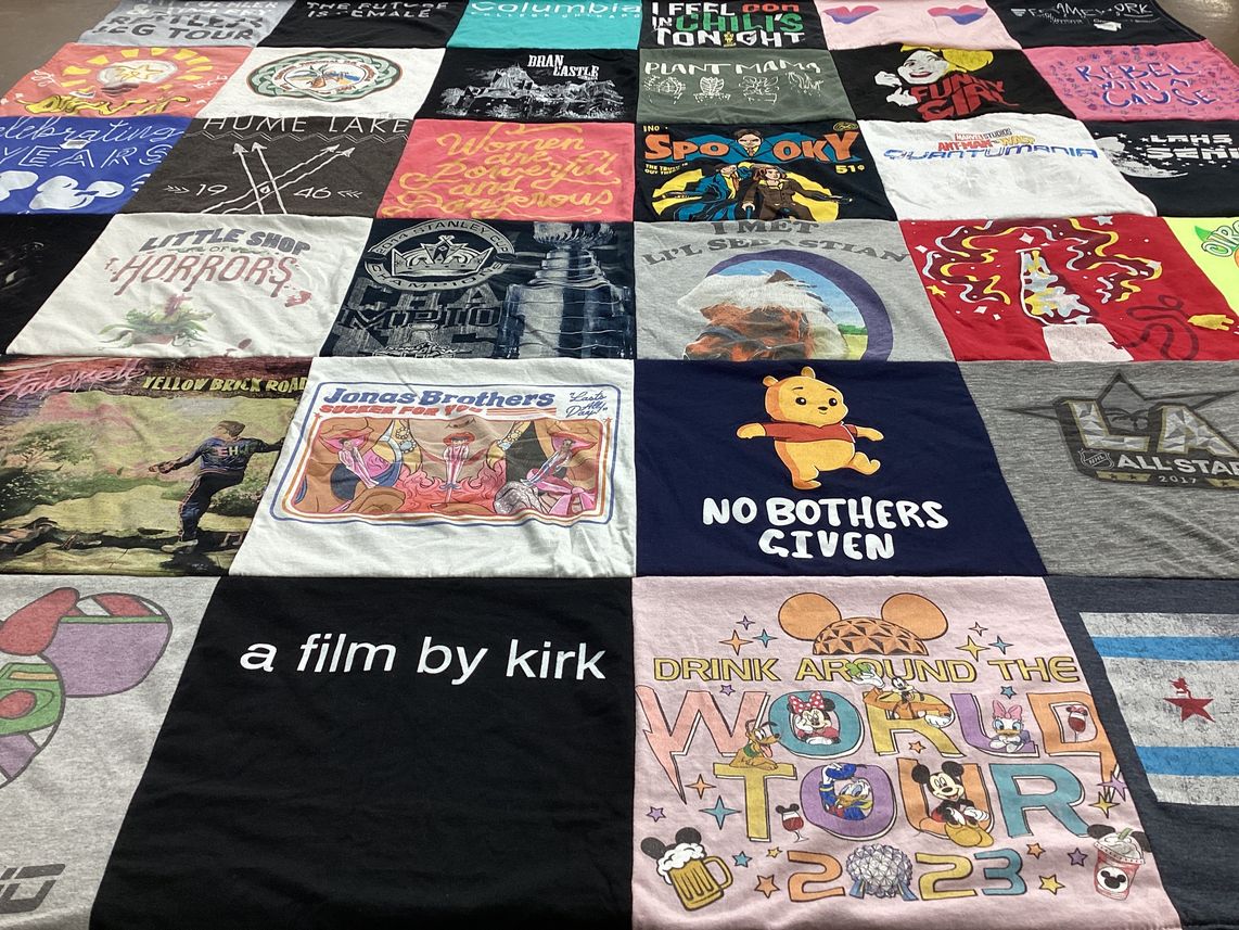T-shirt quilt with music, theater themes by Abby from CA