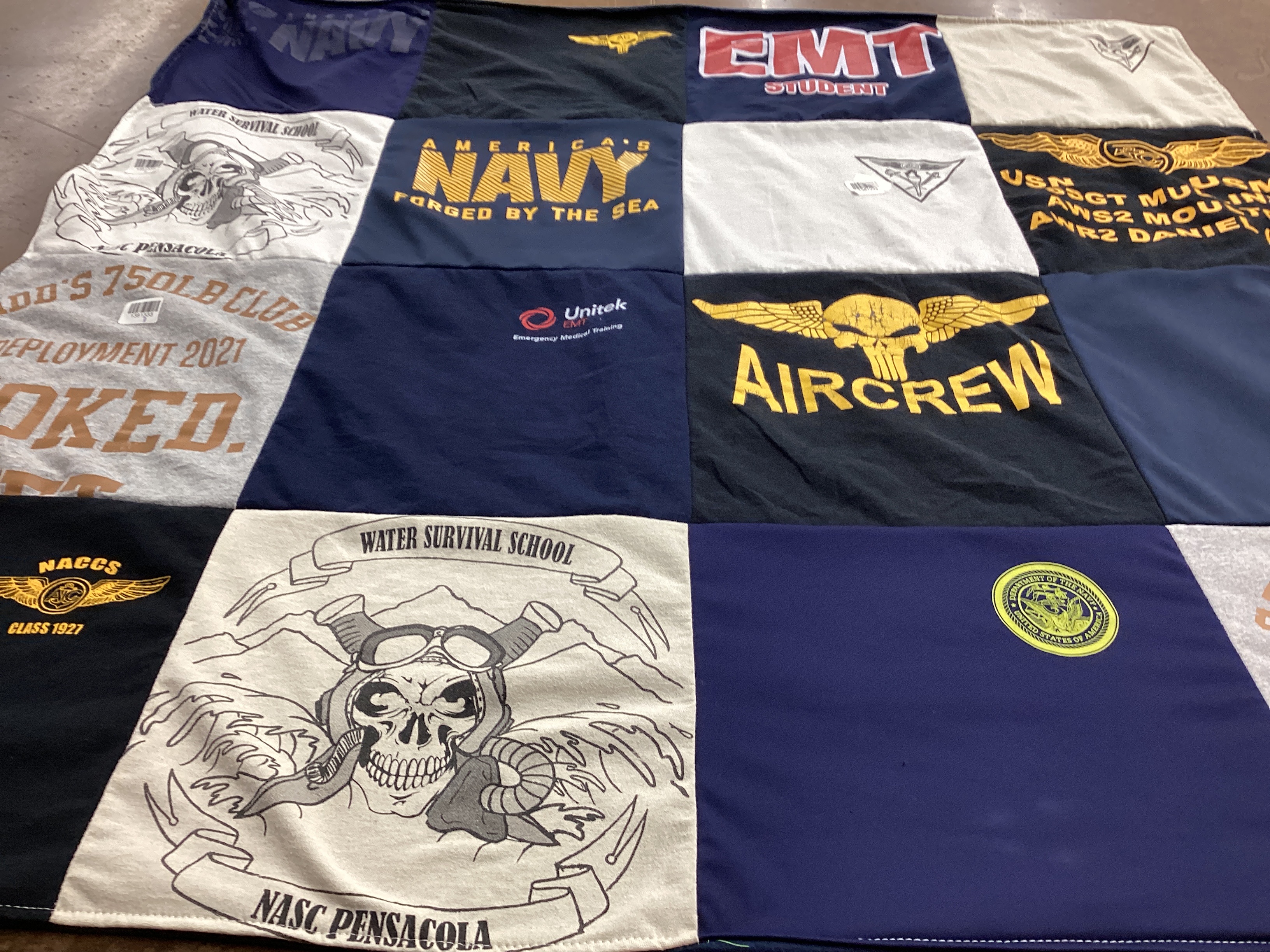 T-shirt quilt with military, emergency medical training themes by Carrie from AZ