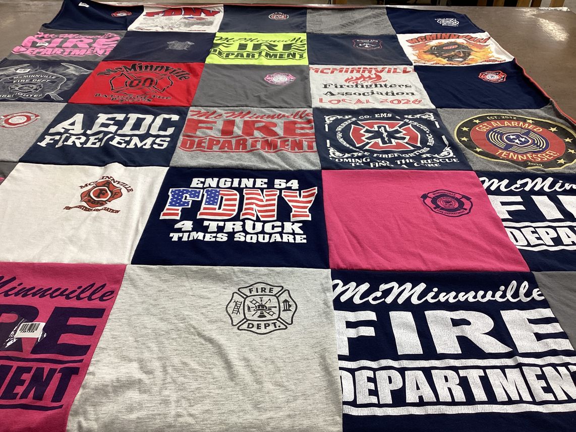T-shirt quilt with firefighting, emergency services themes by KrisAnn from TN