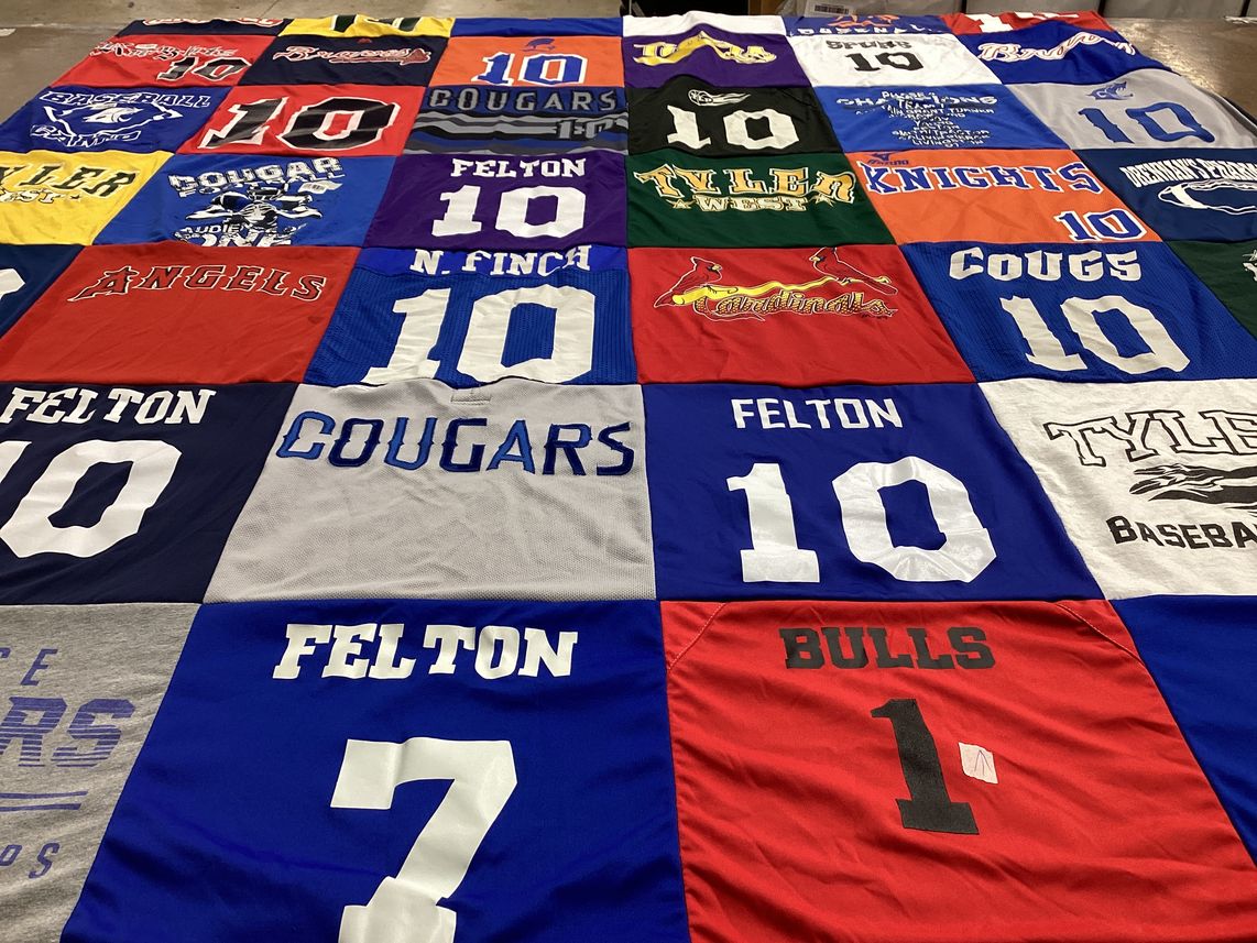 T-shirt quilt featuring cougars, bulls by Jamey from TX