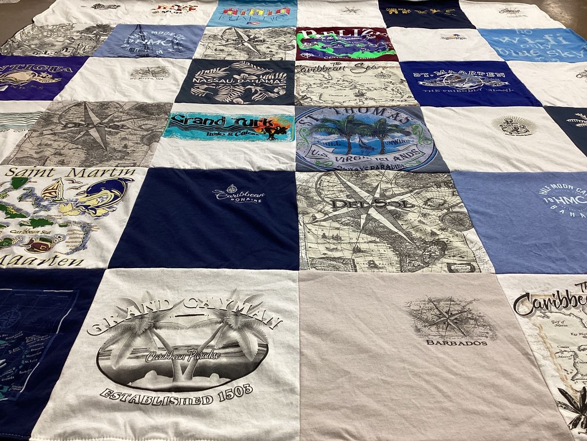 T-shirt quilt with travel, diving themes by Robert from TX