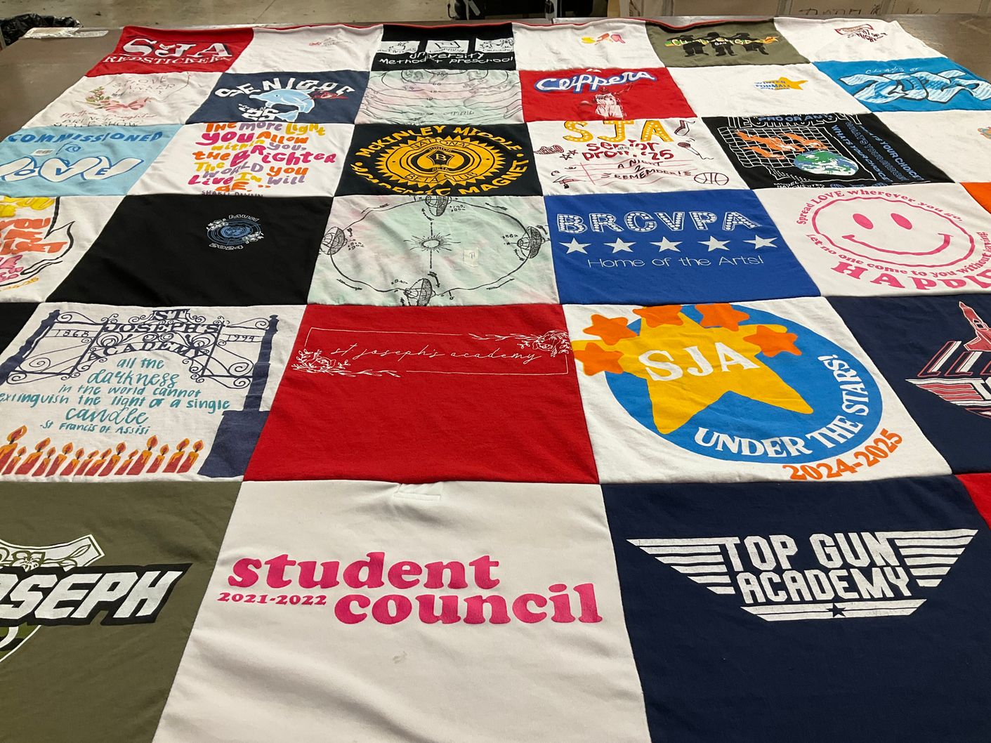 T-shirt quilt from st joseph academy by Toi from LA