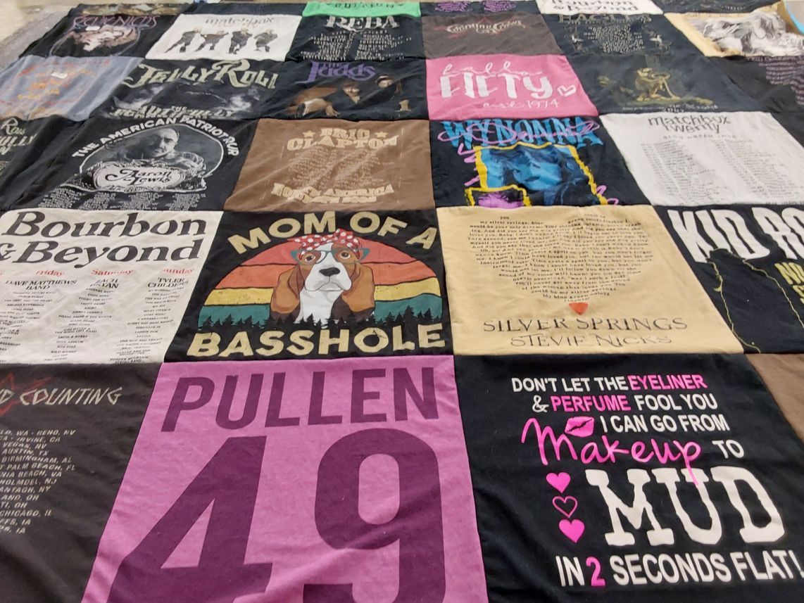 T-shirt quilt with music, dogs themes by Faith from IN