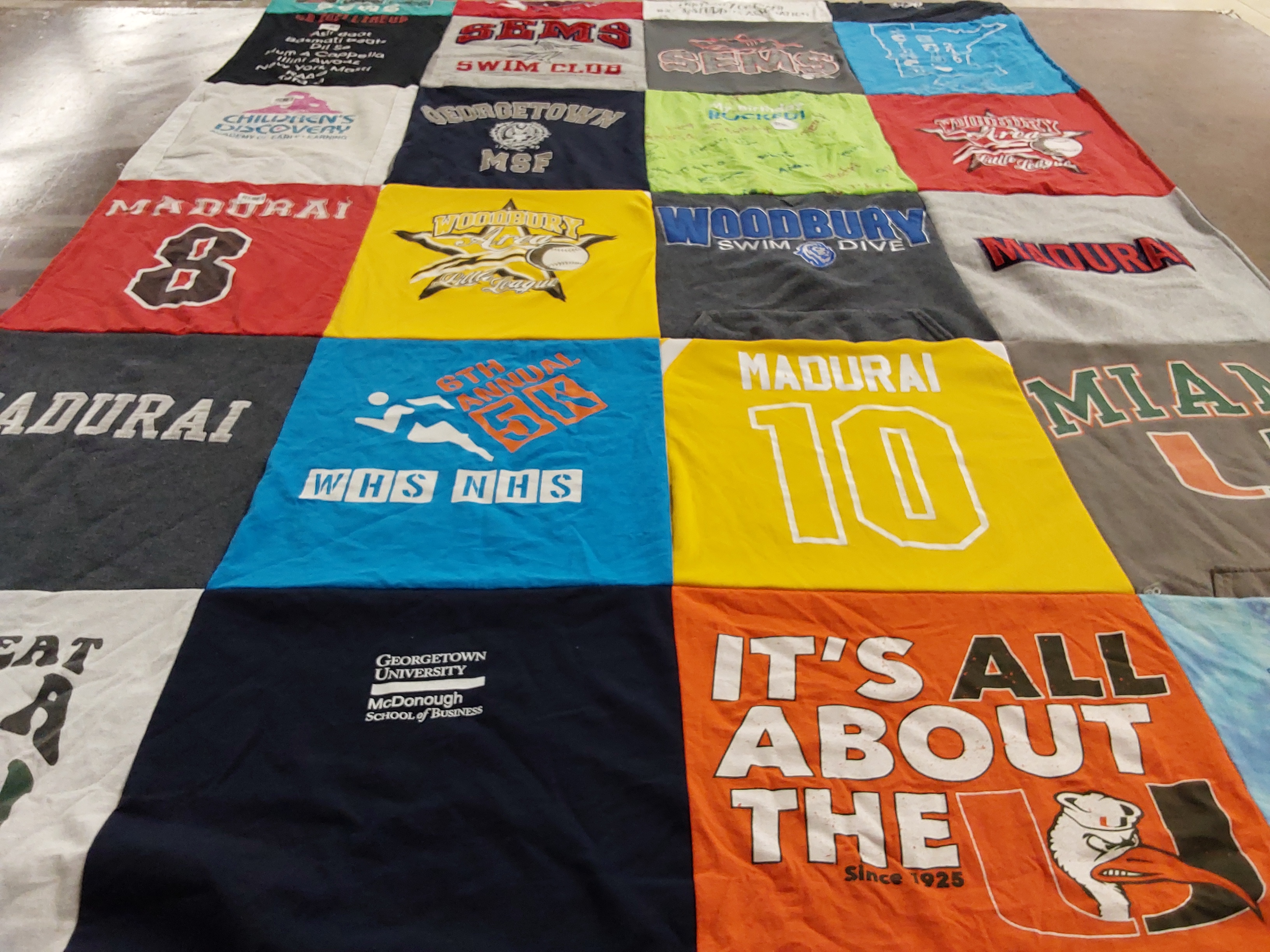 T-shirt quilt featuring woodbury swim dive by Shuba from MN
