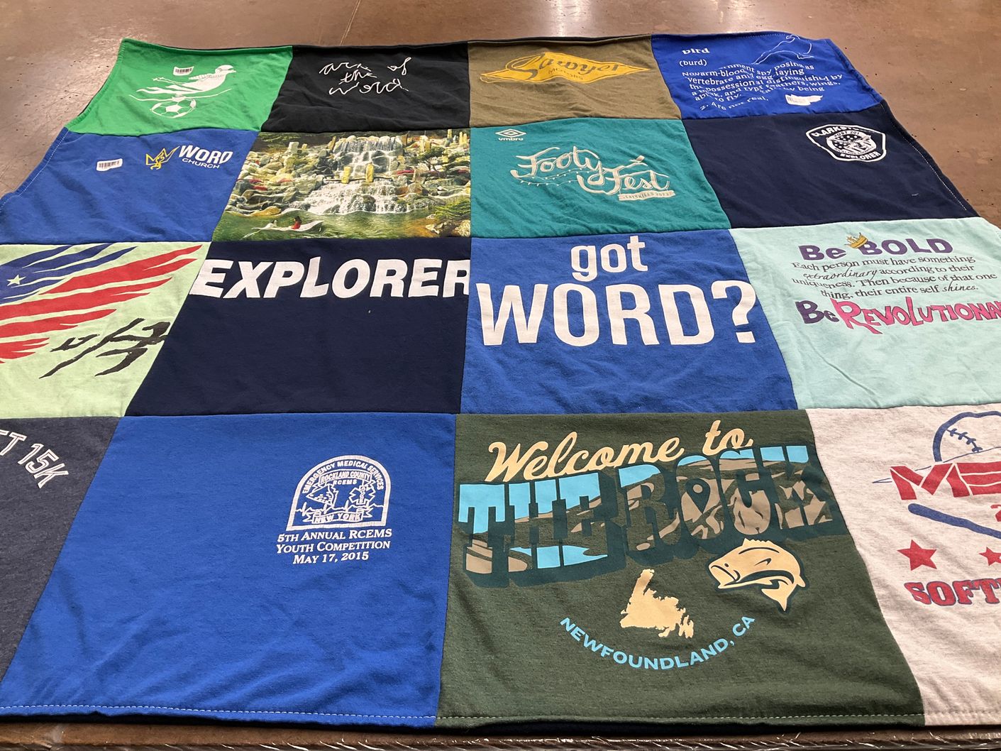 T-shirt quilt with sports, community themes by Sarah from NY