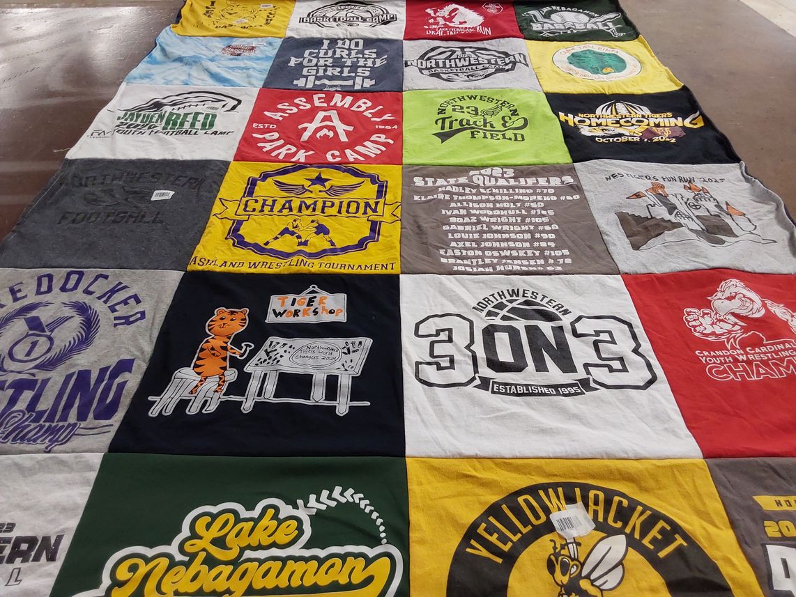 T-shirt quilt featuring northwestern university football, northwestern university track and field by Katy from WI