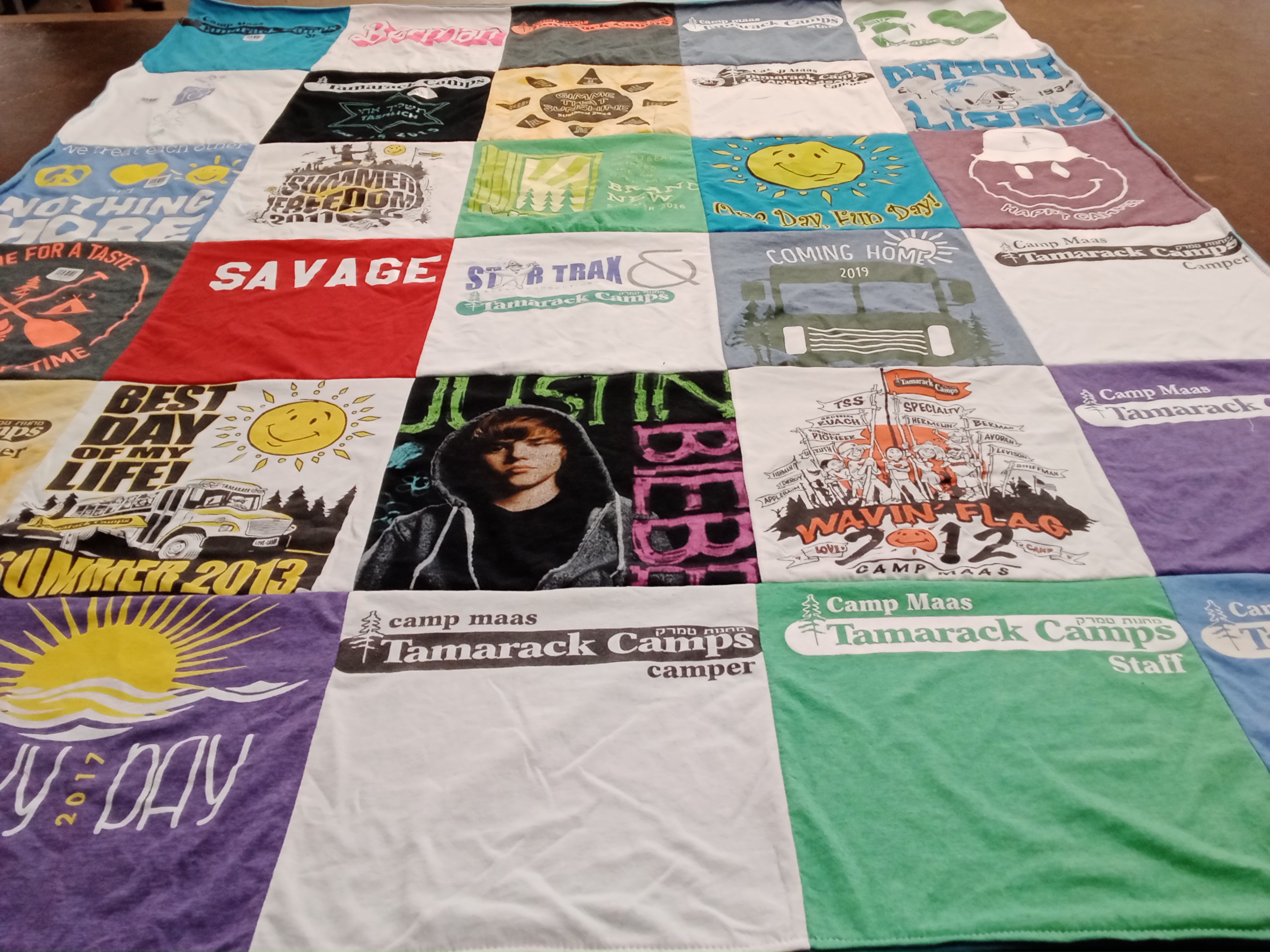 T-shirt quilt with camping, music themes by Renee from MI