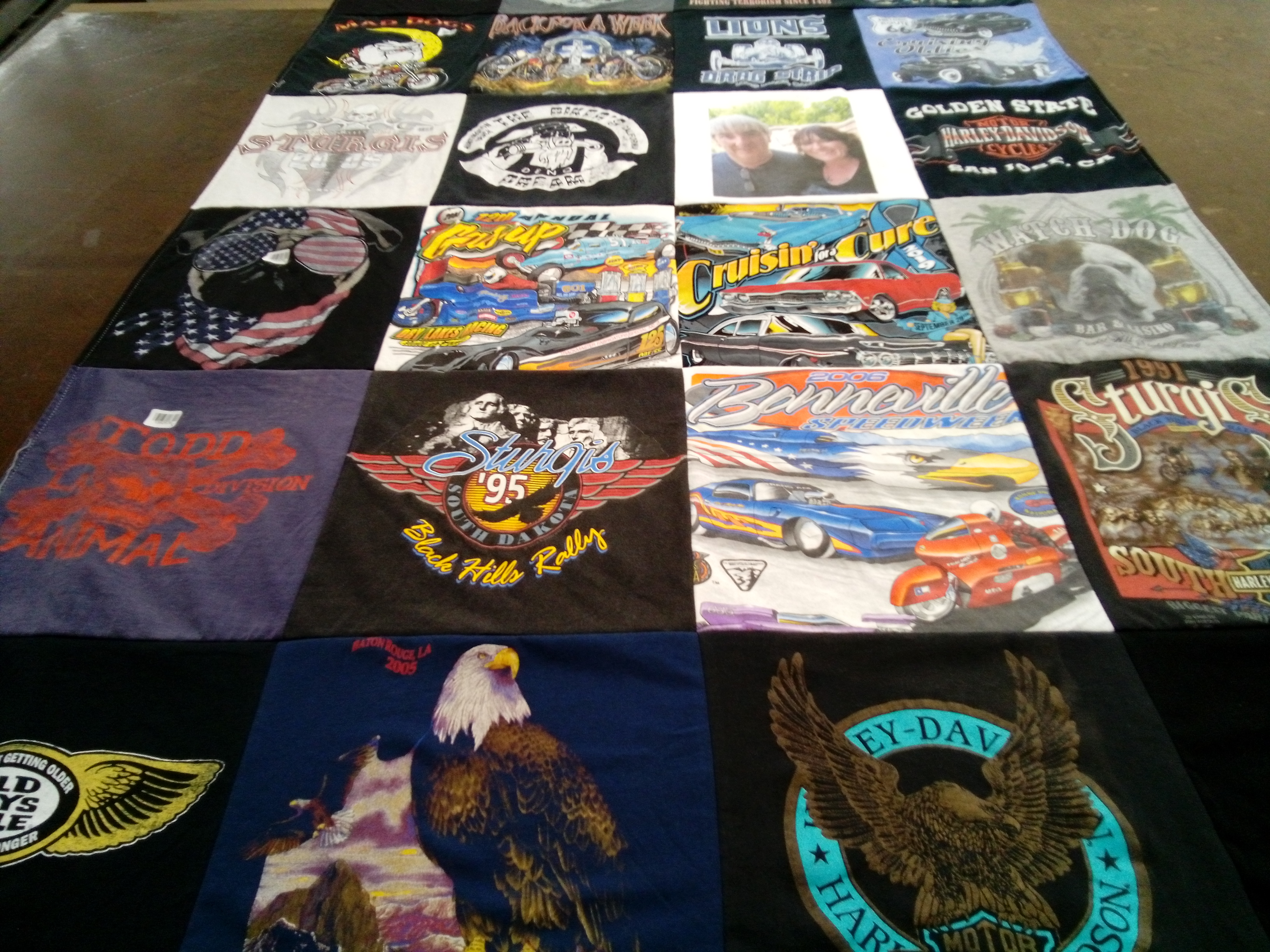 T-shirt quilt with biking, barbecue themes by marilyn from CA