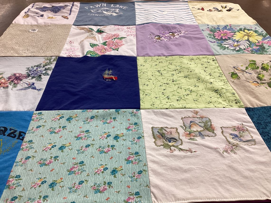 T-shirt quilt with nature, flowers themes by Myla from NJ