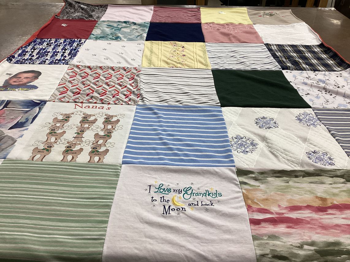 T-shirt quilt with family, holiday themes by Katie from NJ