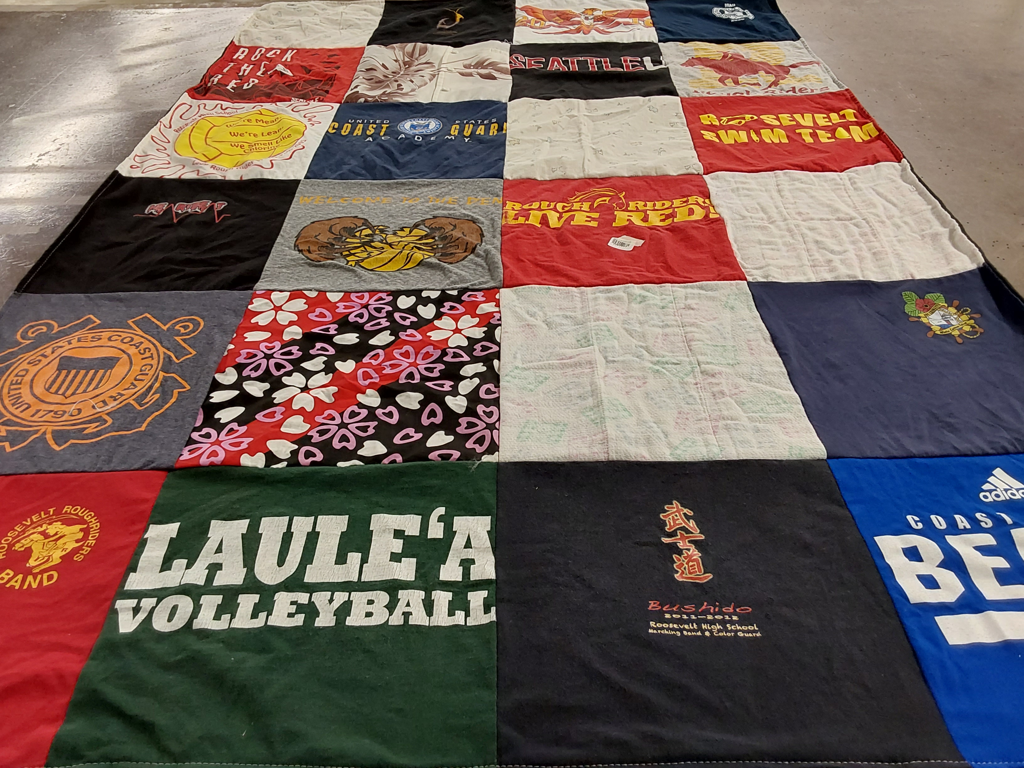 T-shirt quilt featuring swim team by Kacie Ann from LA