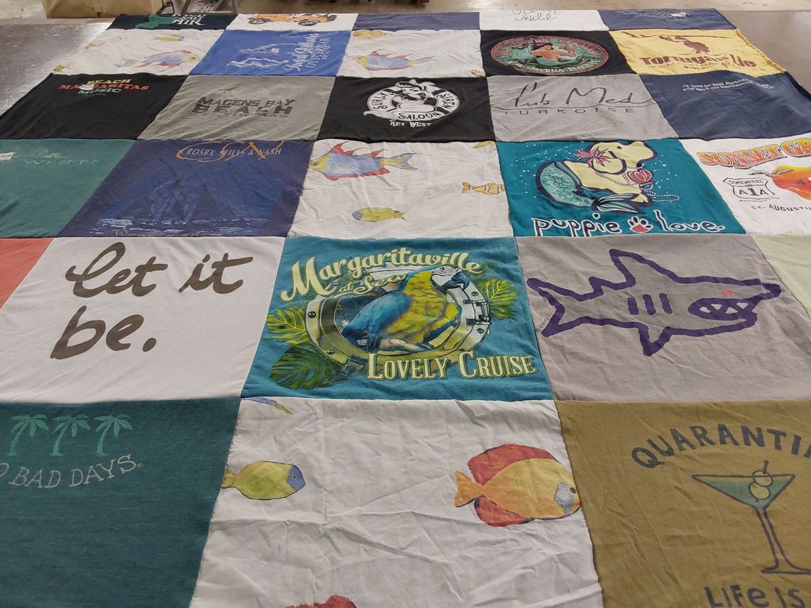T-shirt quilt with beach, travel themes by Laurie from FL