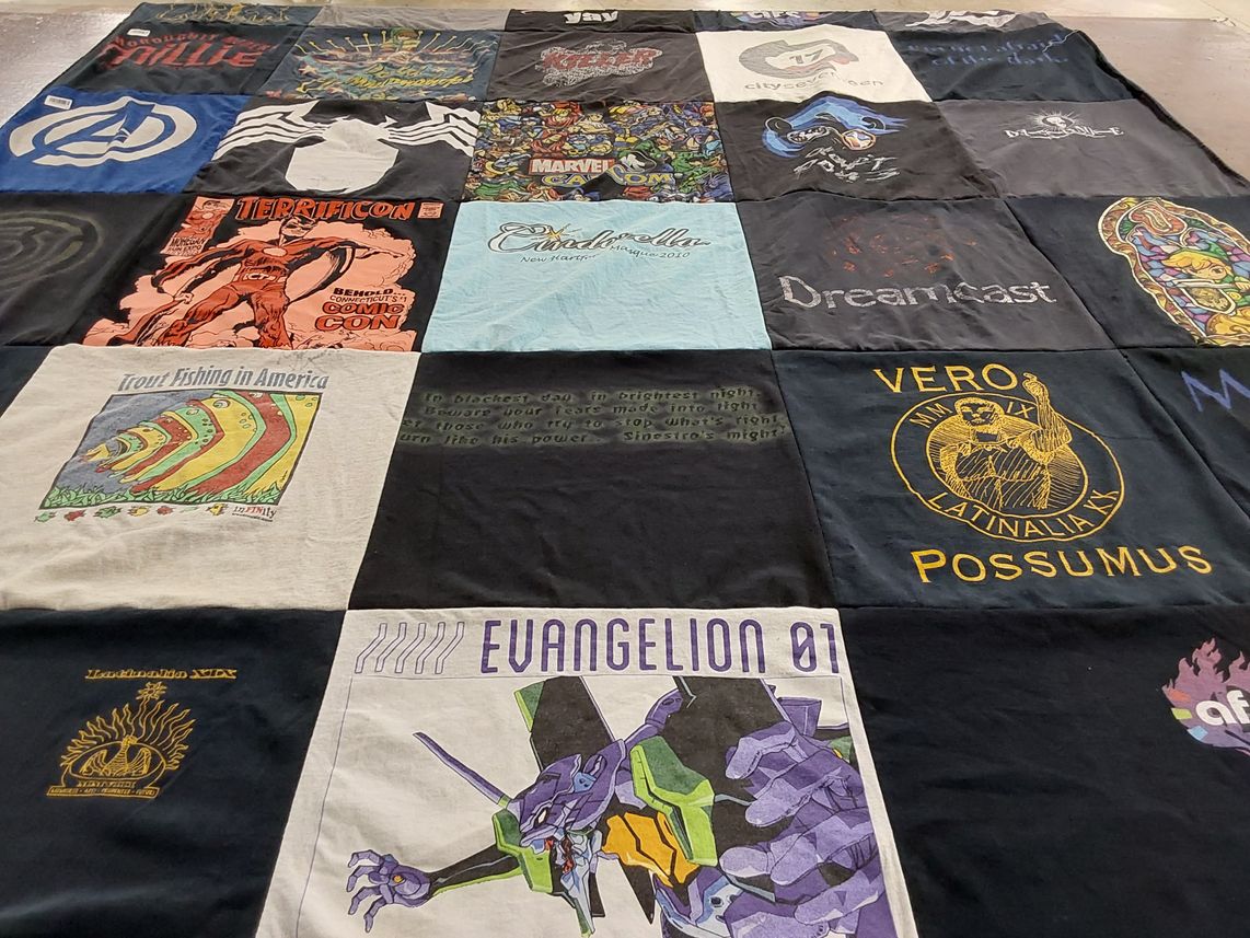 T-shirt quilt with comics, anime themes by Janis from NY