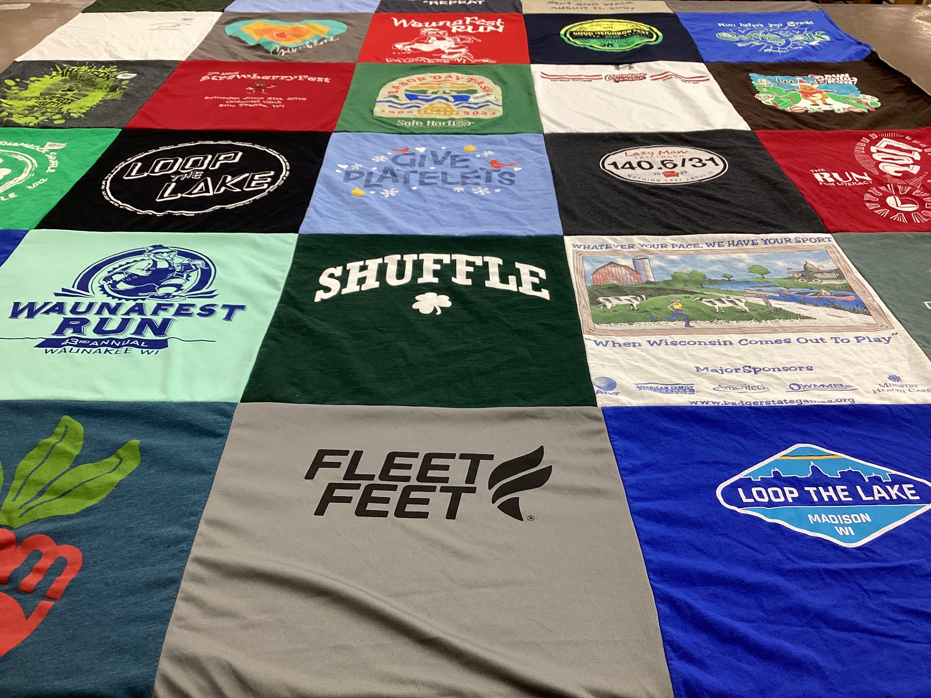T-shirt quilt with running, festivals themes by Joe from WI