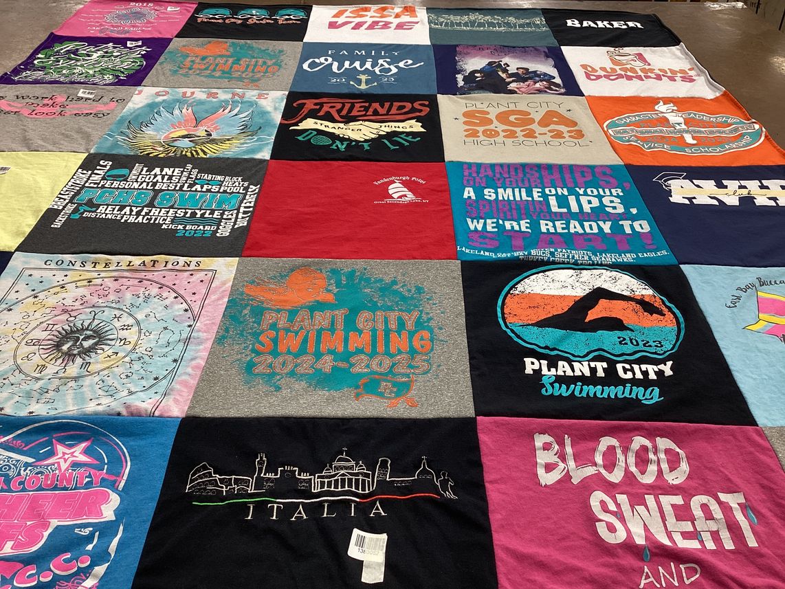 T-shirt quilt featuring plant city swimming by JUDY from FL