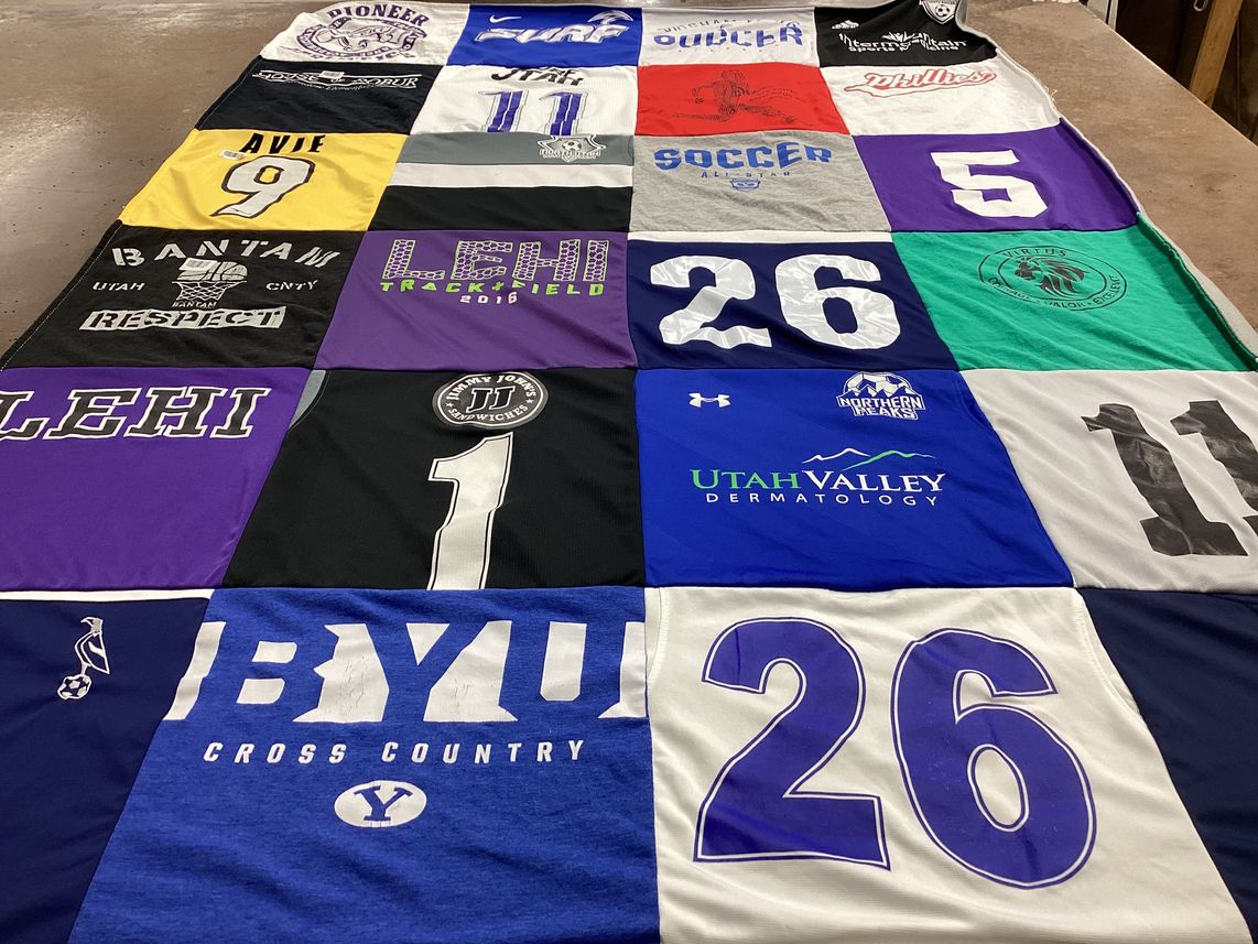 T-shirt quilt featuring byu cross country, northern brass by Jayna from UT