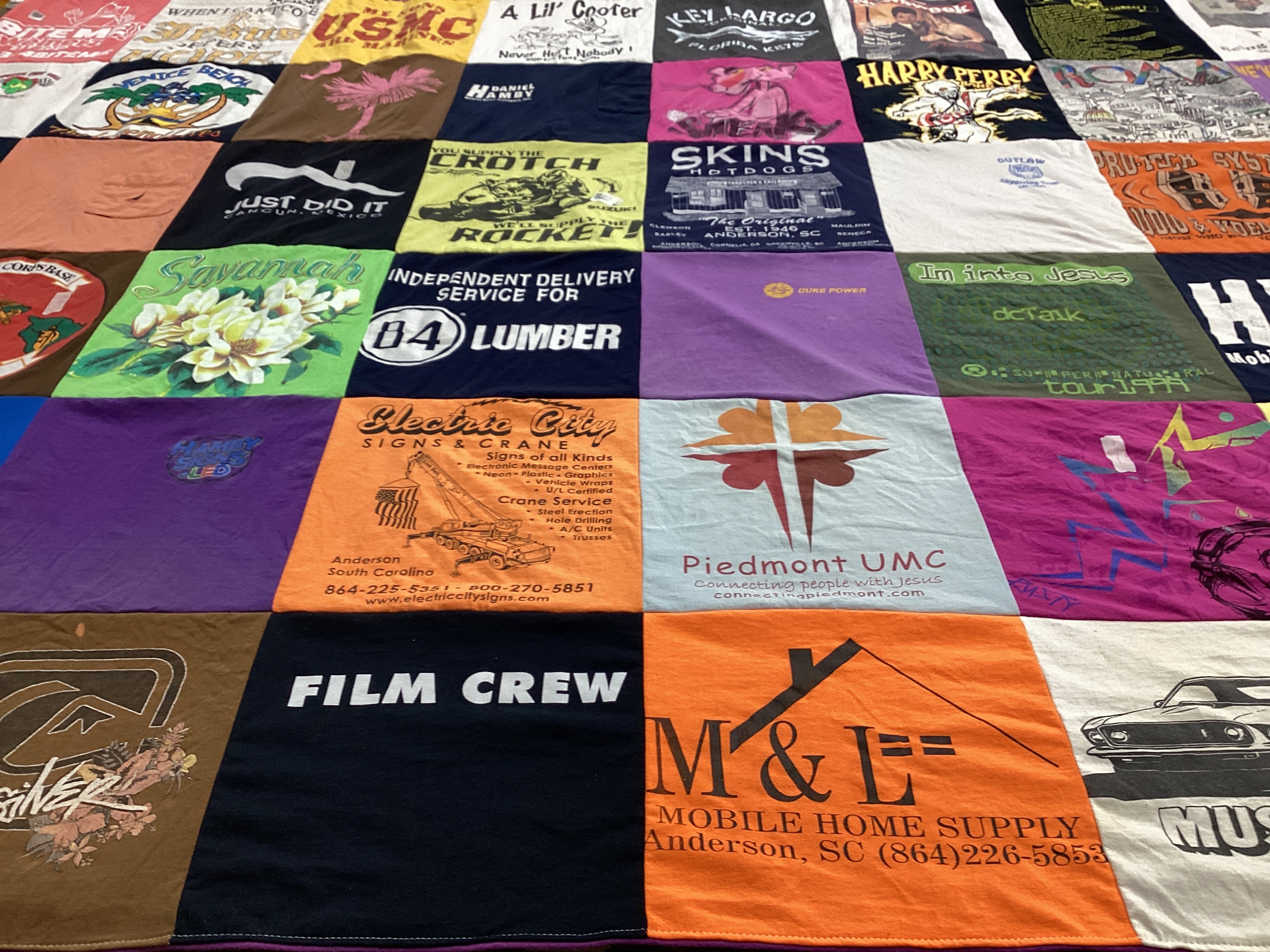 T-shirt quilt with theater, delivery themes by Sonya from SC