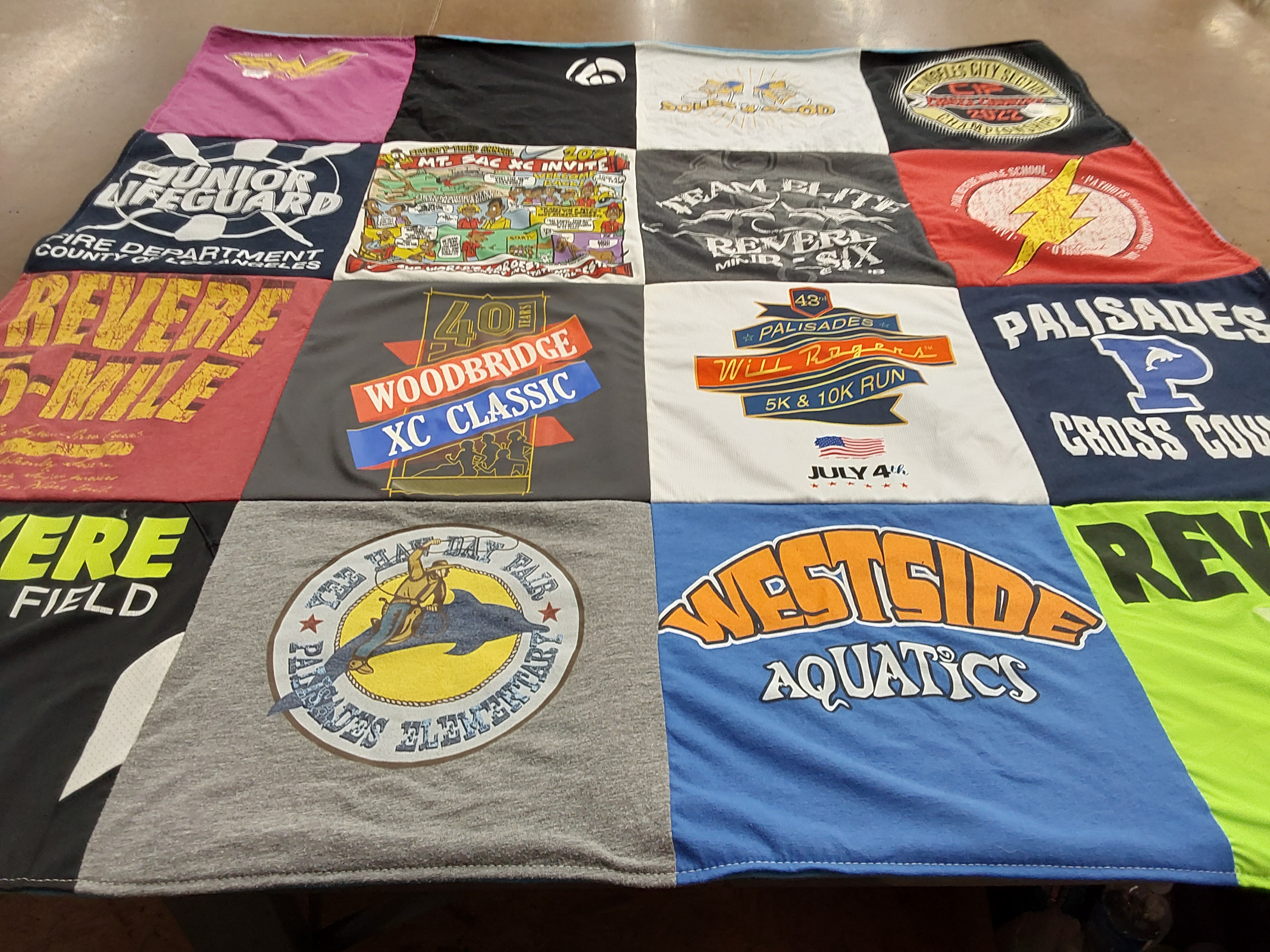 T-shirt quilt featuring revere cross country team, woodbridge xc team by Fati from CA