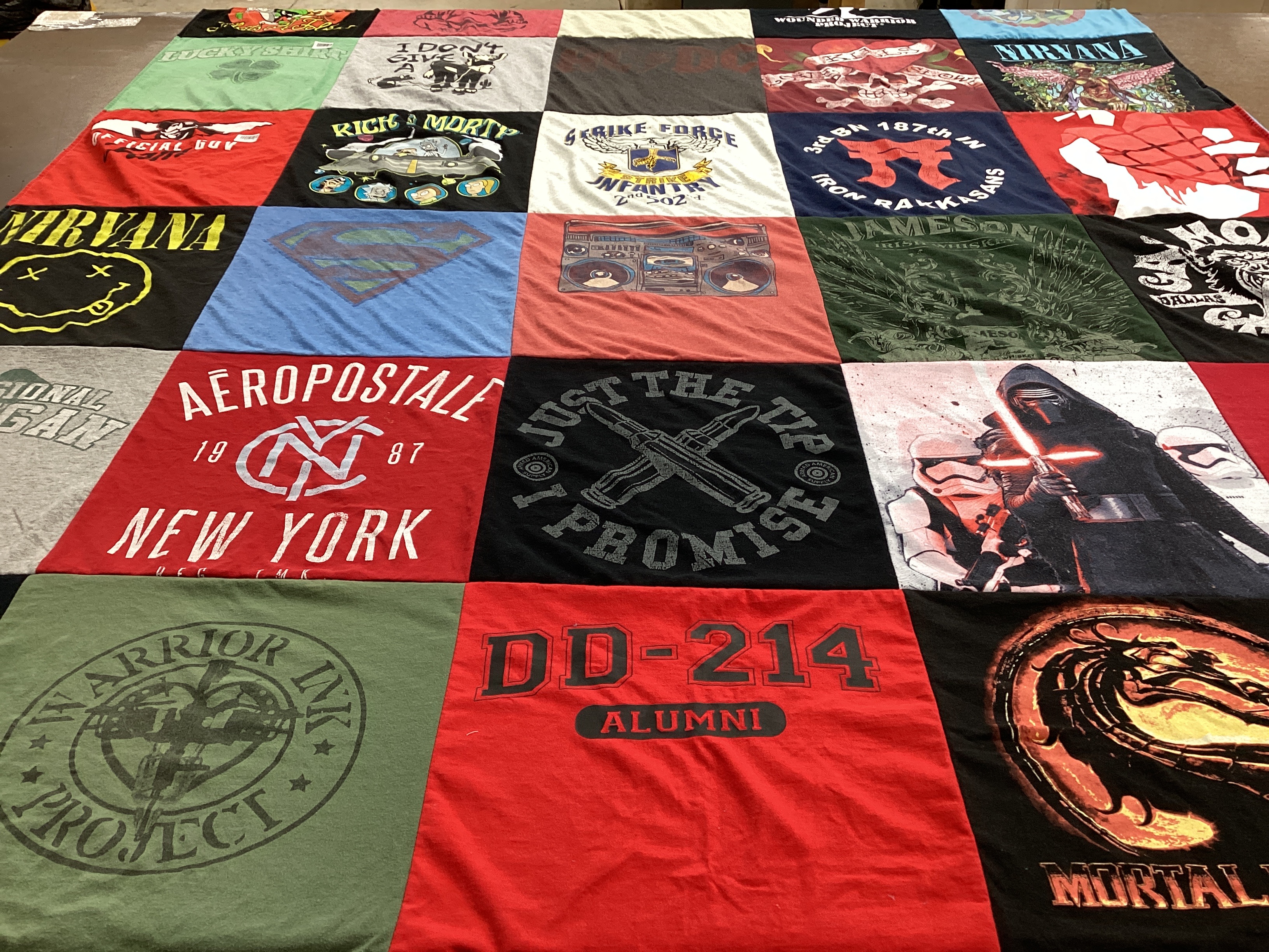 T-shirt quilt with music, comics themes by Jeffrey from TN