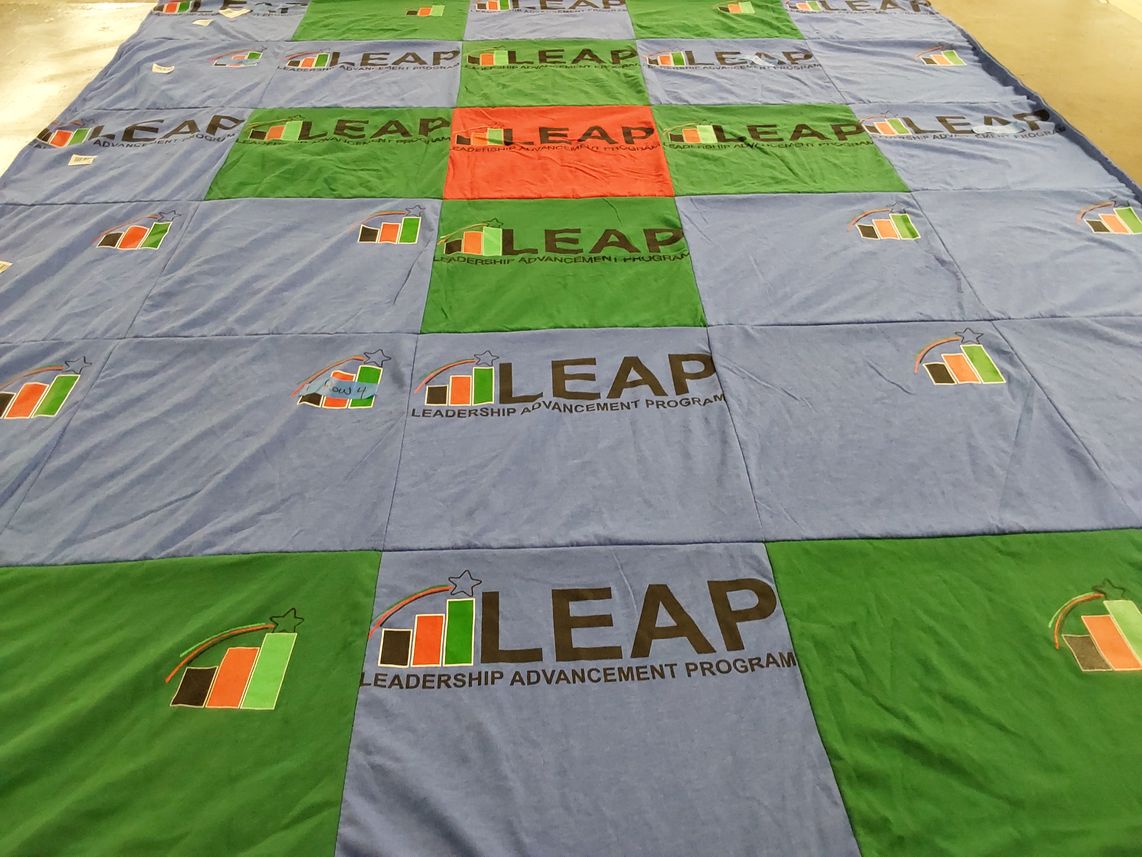 T-shirt quilt with leadership, education themes by Tom from NY